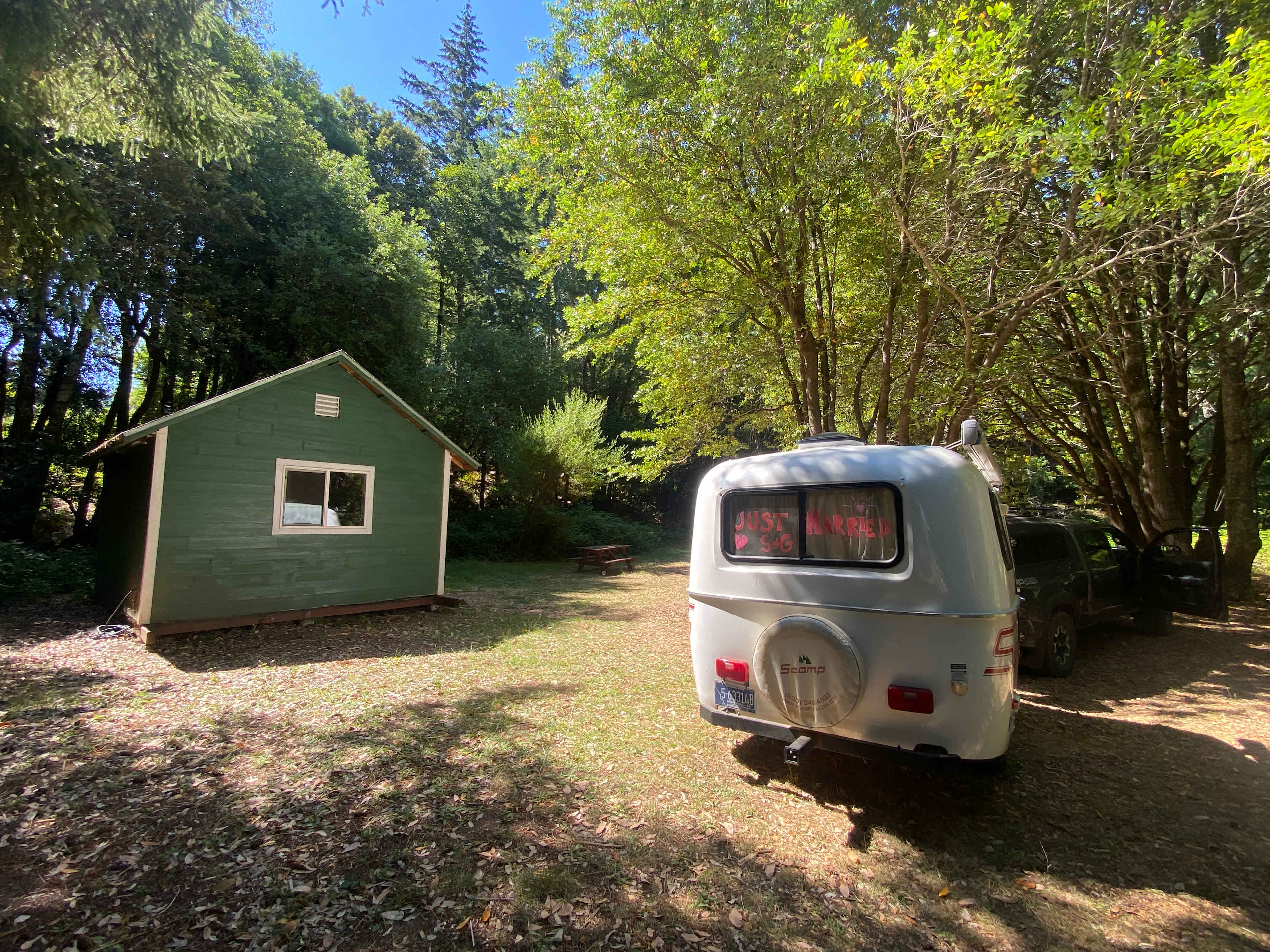 Perfect for our little scamp.  The small building had cold water and flush toilet.  There is a large fire pit, picnic table and bench on the property.  There were several places that had hoses for water on the property, we used it to wash dishes, but not drink