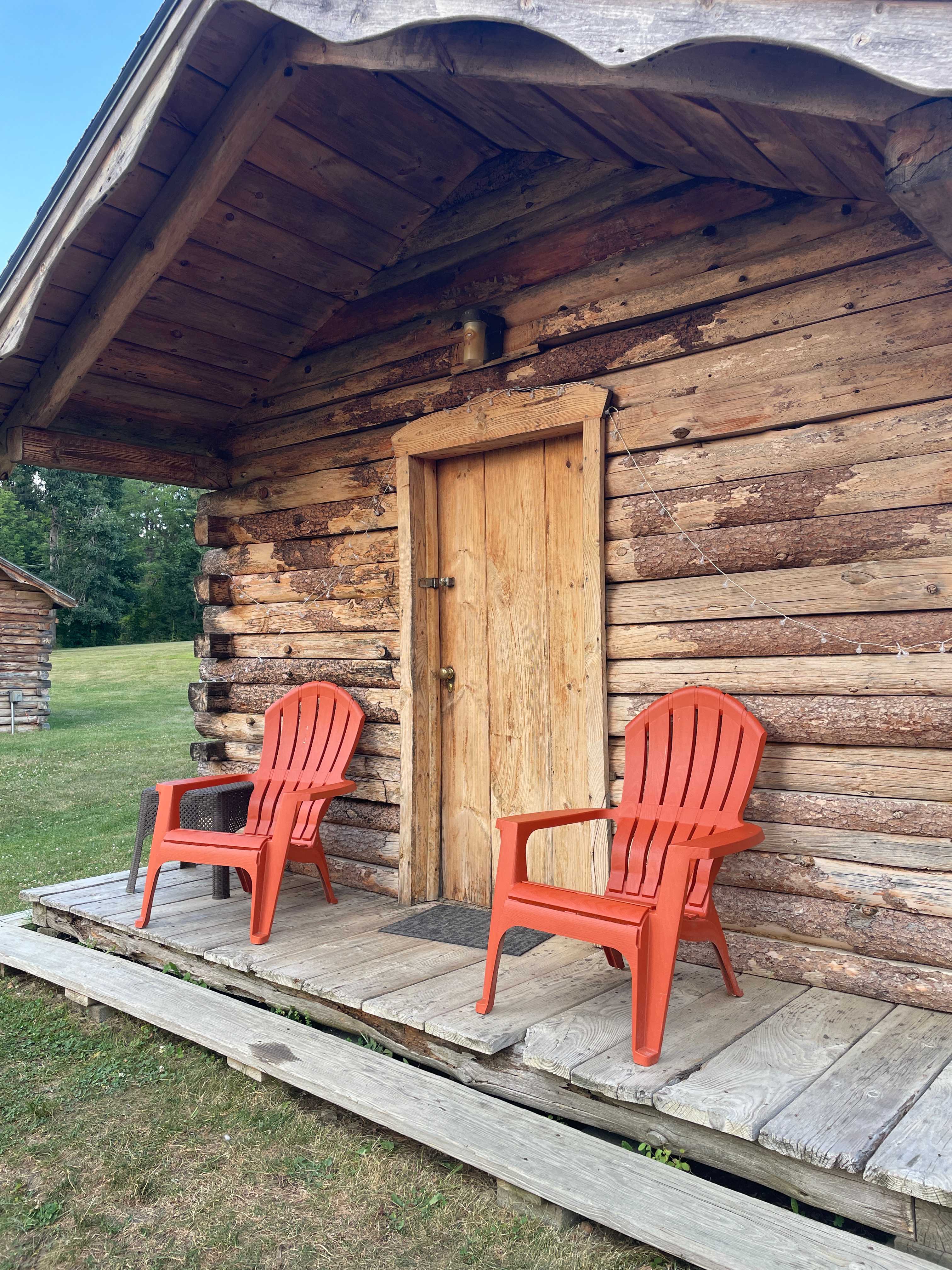 Outside of the cabin, with chairs included! 