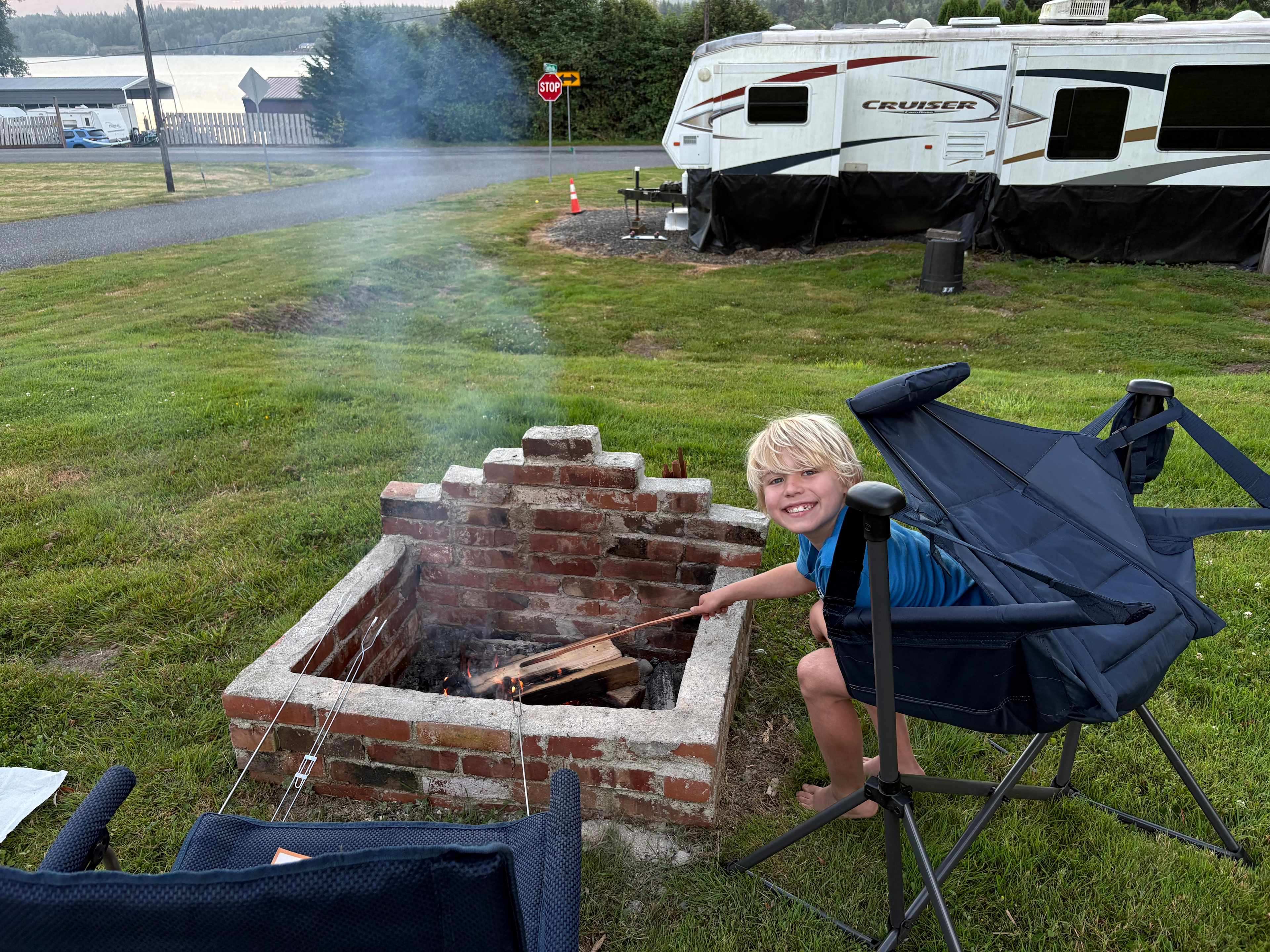 Fire pit with a lake view