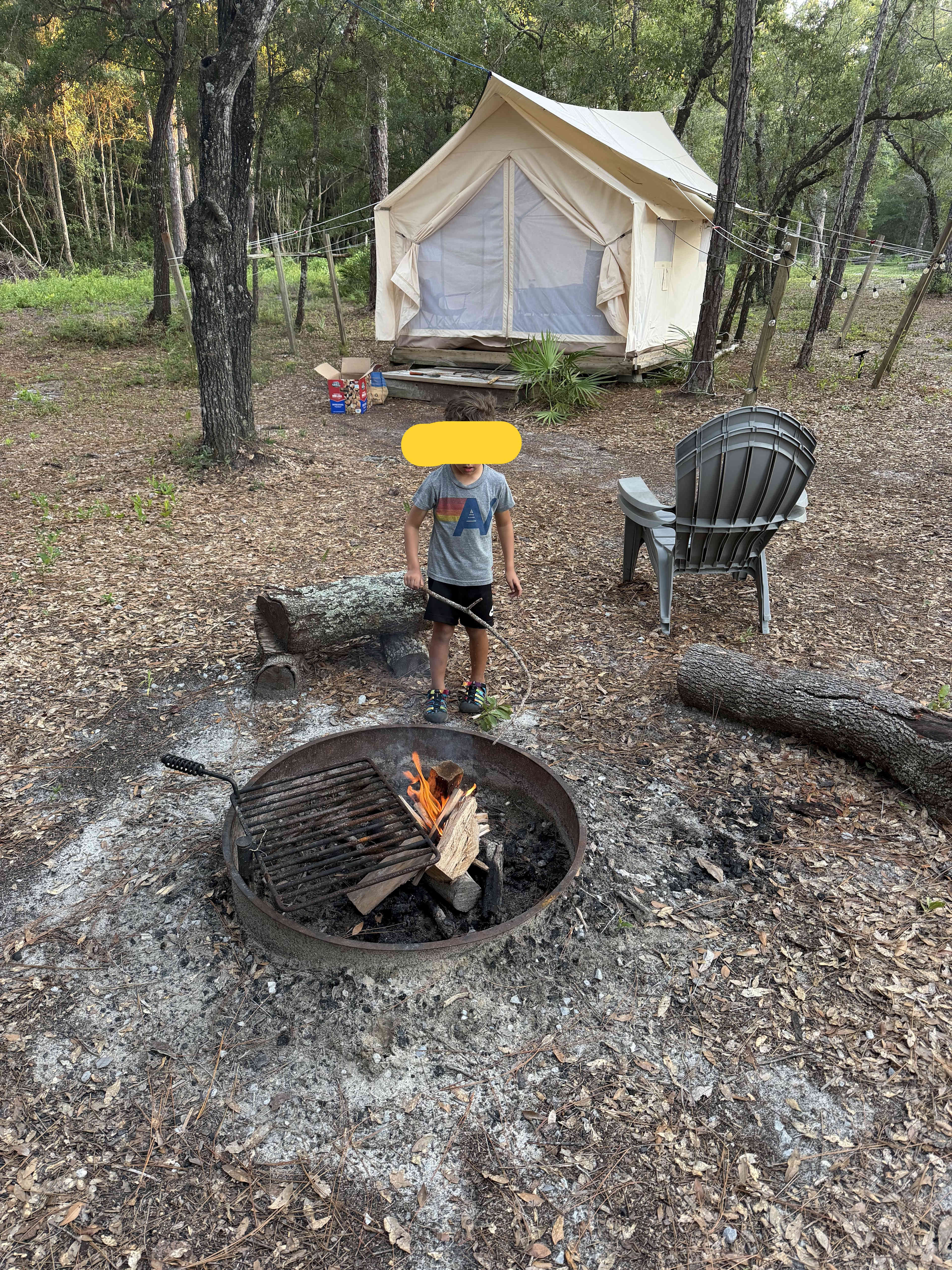 As all boys are, he's fascinated with fire.
