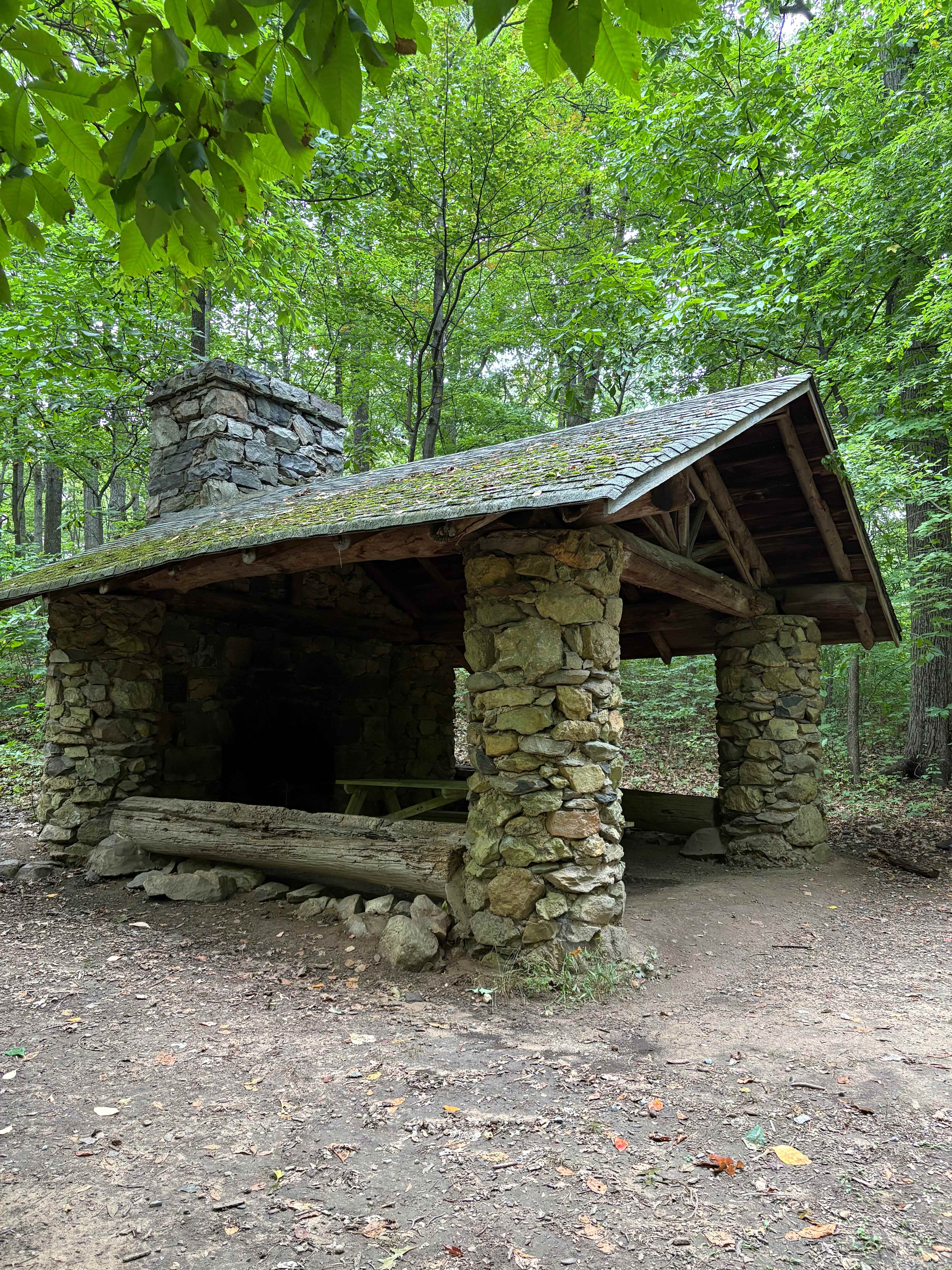 This shelter includes a picnic table and is right at the entrance to the campground. Very nice to sit under during a rainstorm. 
