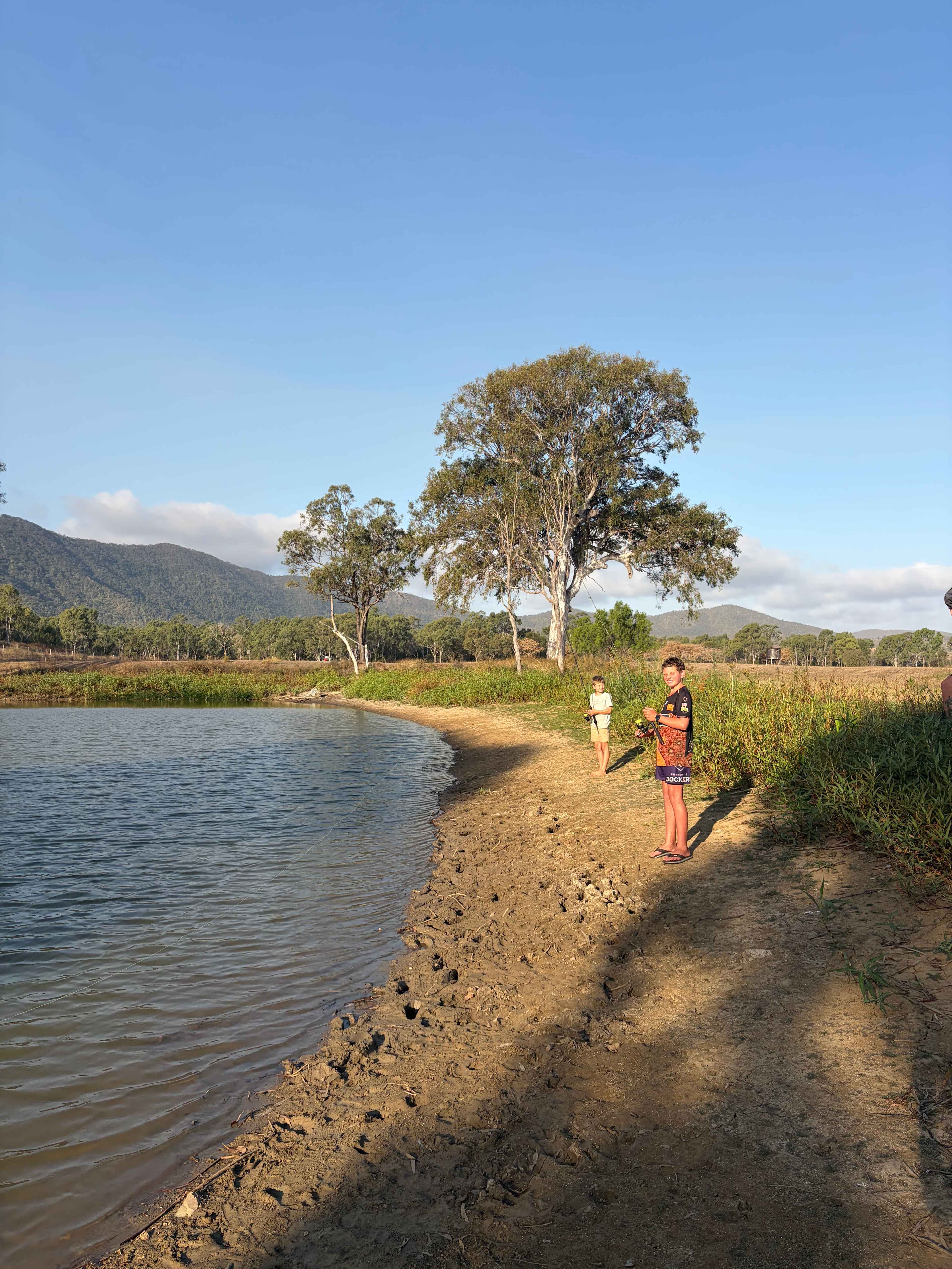 Boys fishing in the dam