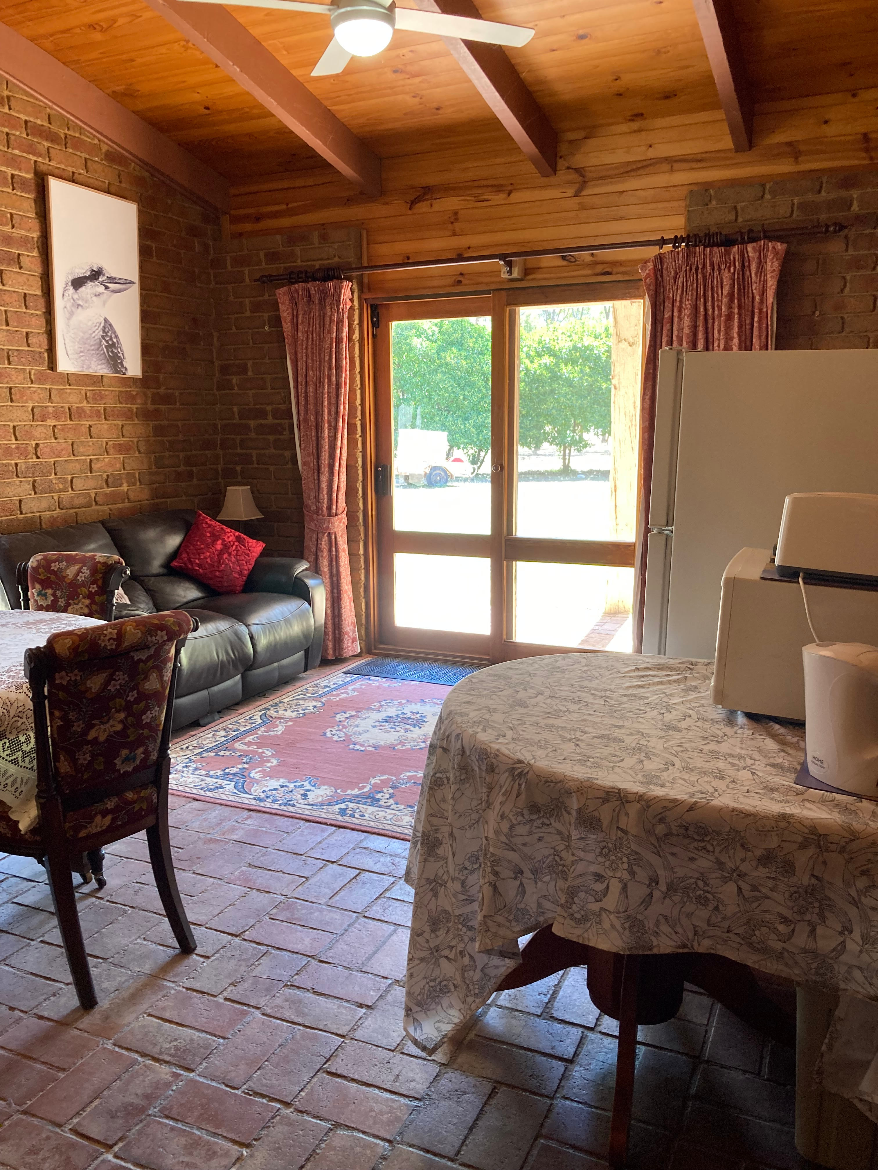 Sitting room is fully equipped with kitchenette, dining table and sitting area. 