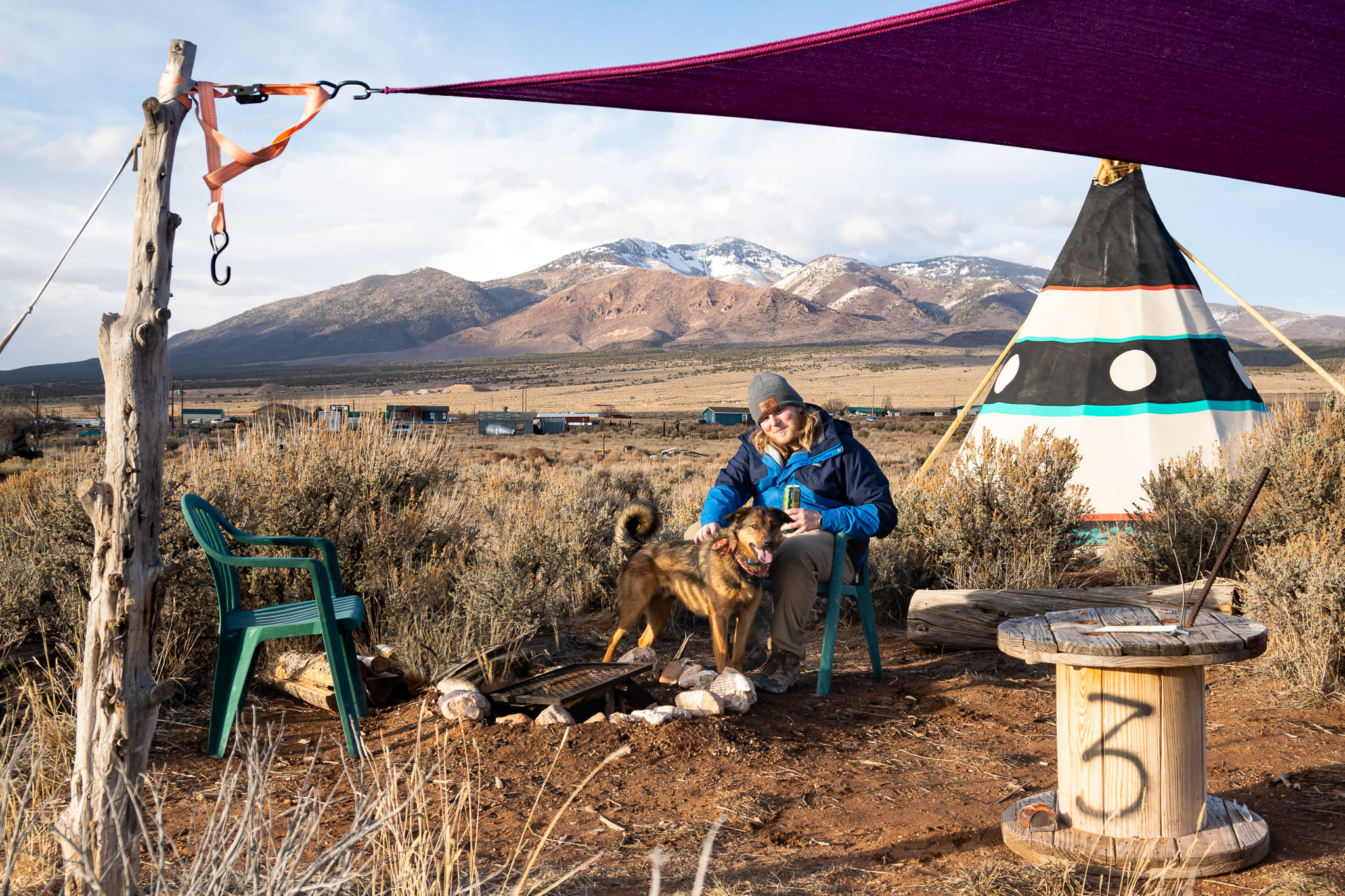 Relaxing with Ringo the camp dog at campsite #3.