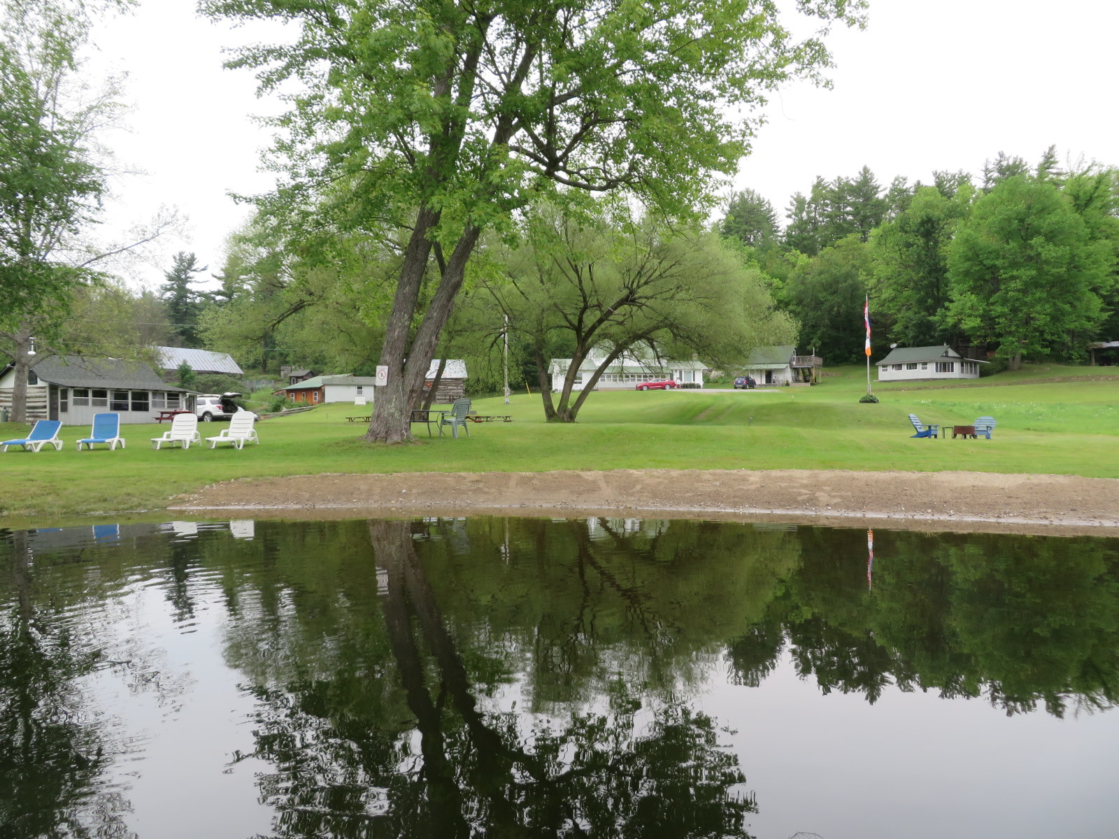 Our lakeside property. Lower cabin on left, Upper cabin on right