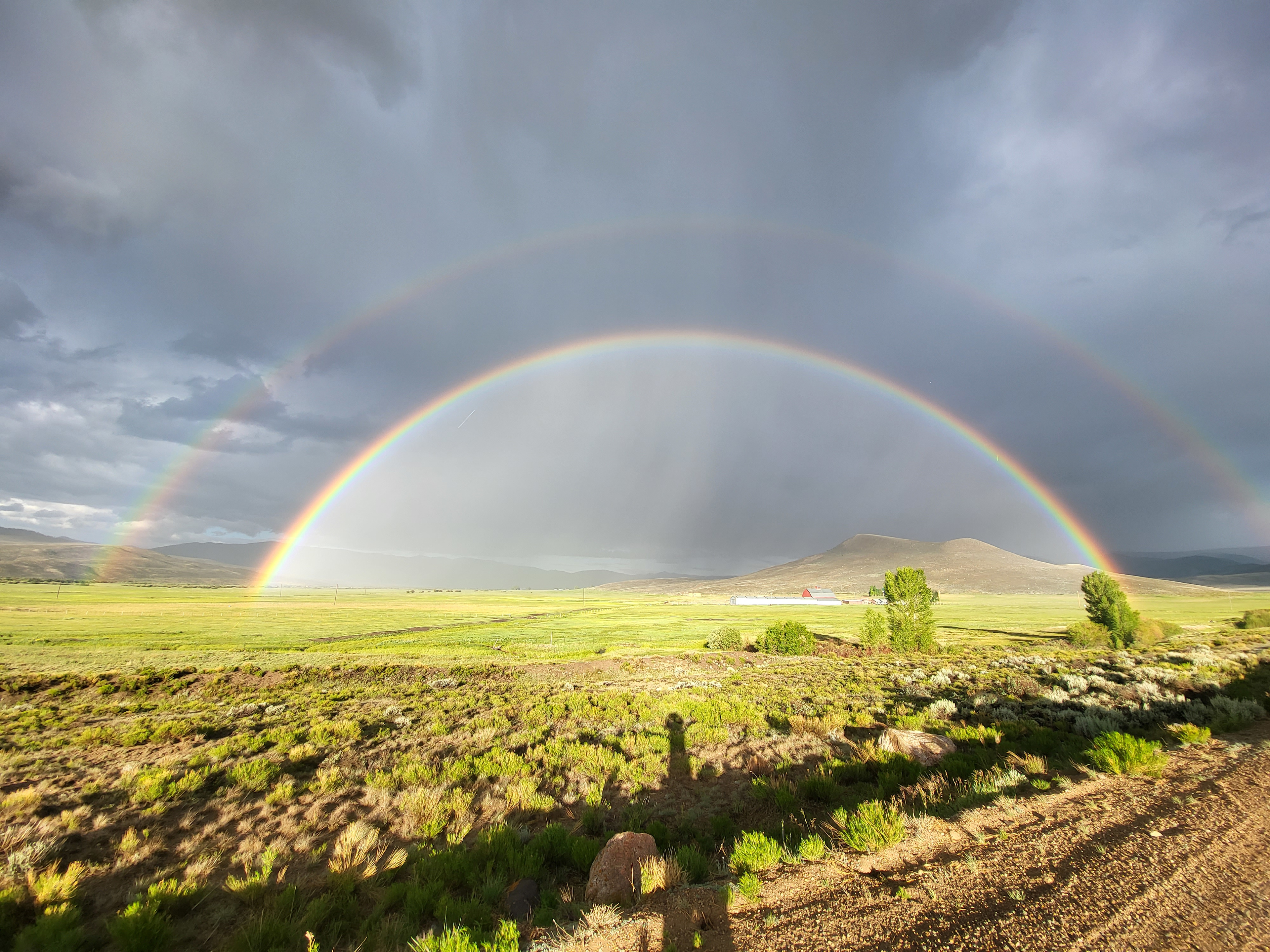 Double rainbow!!! Over the neighbors ranch landing on needles creek.