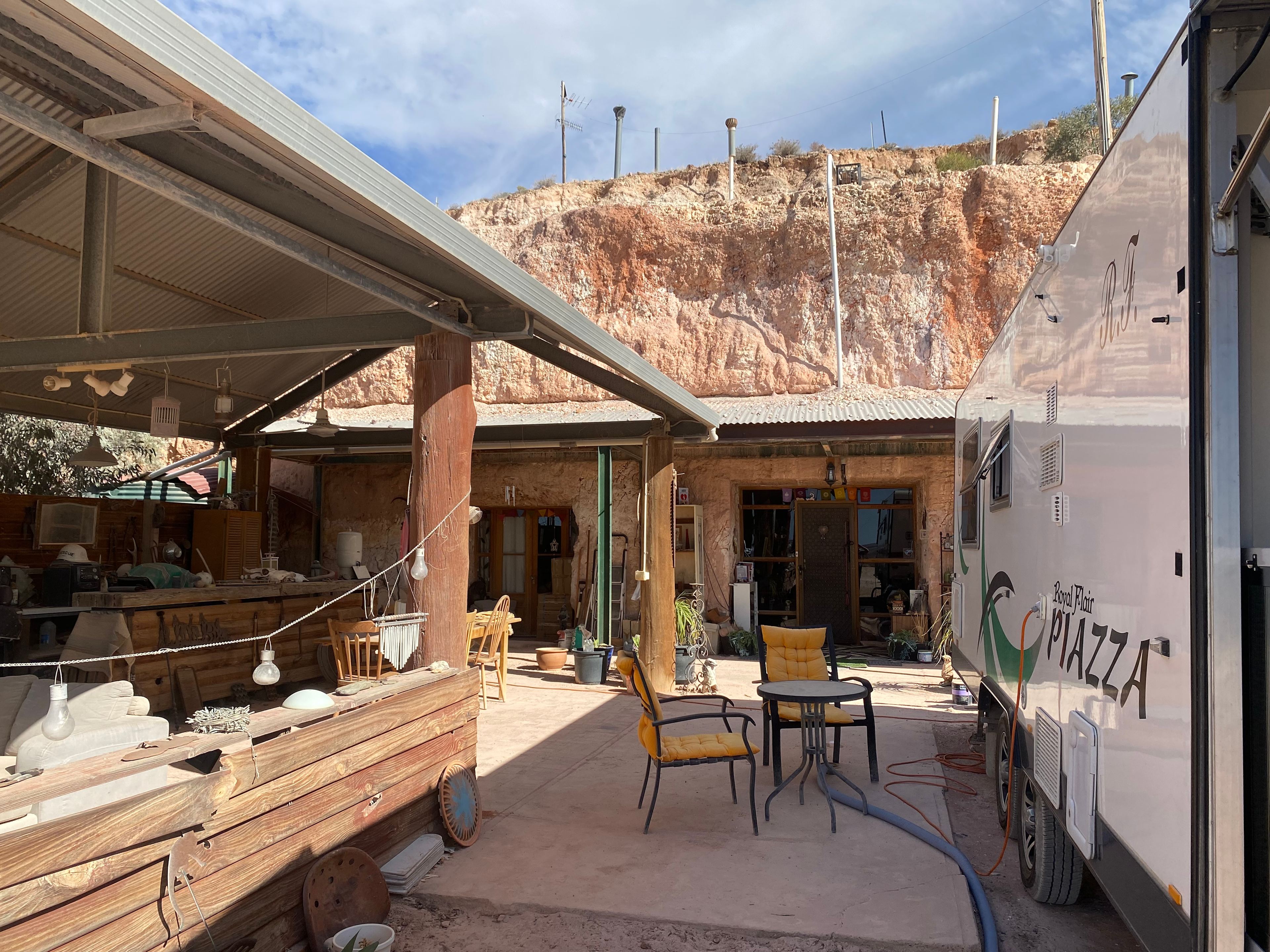 Karen’s residence and a Bnb cut into the cliff face. Guest pavilion at front. 