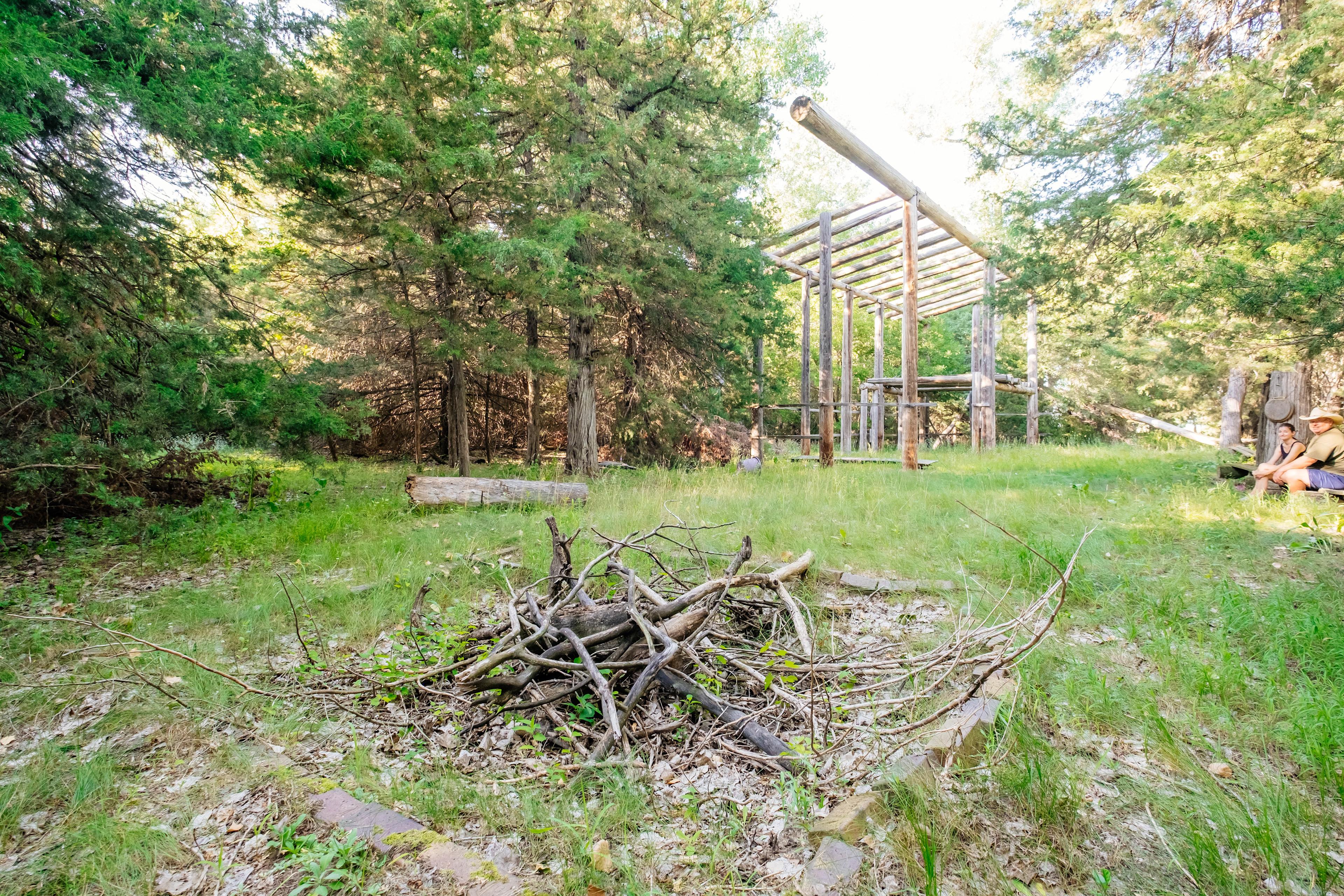 Large fire pit in tent site