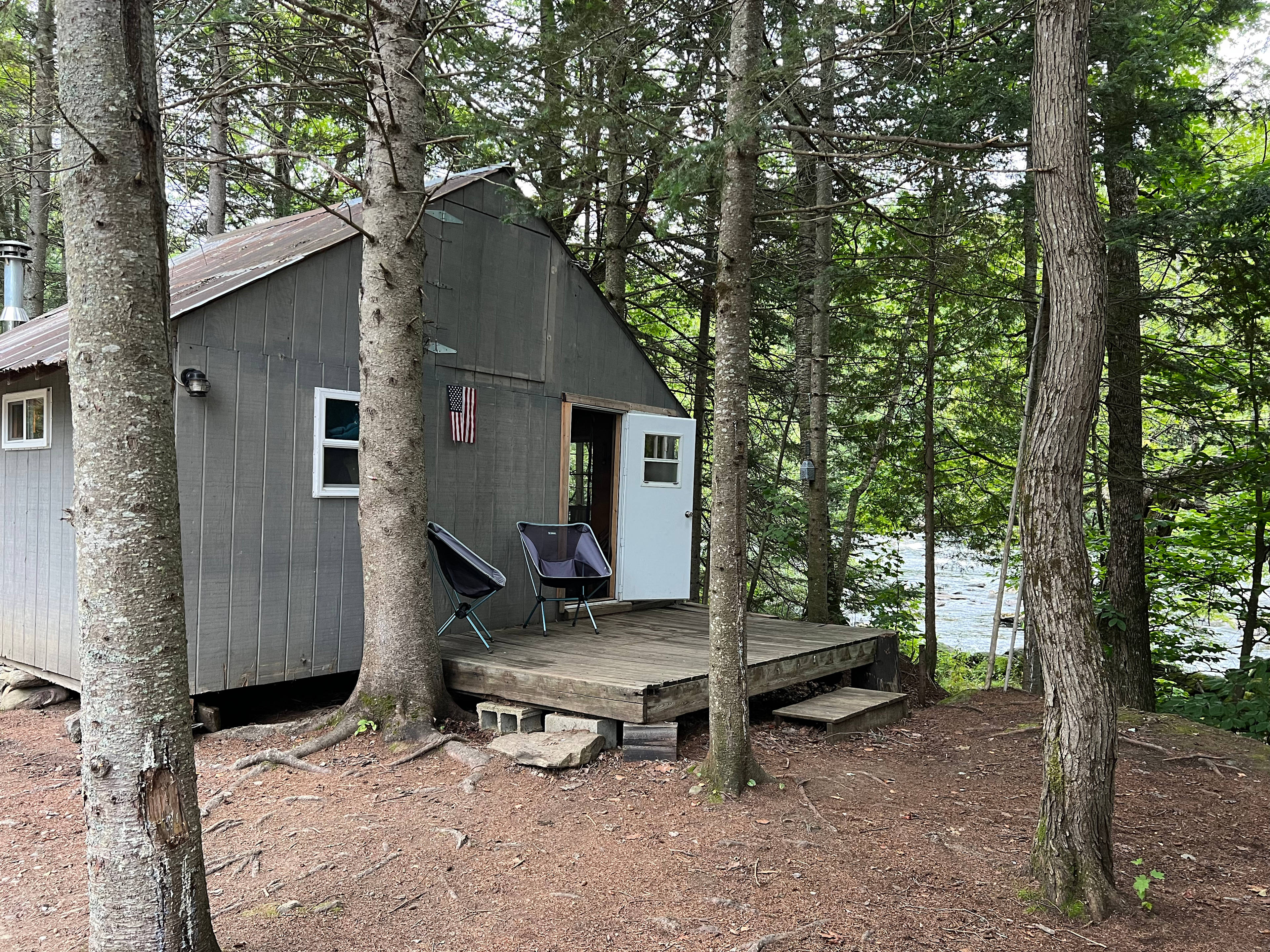Grey Cabin next to Androscoggin River.
