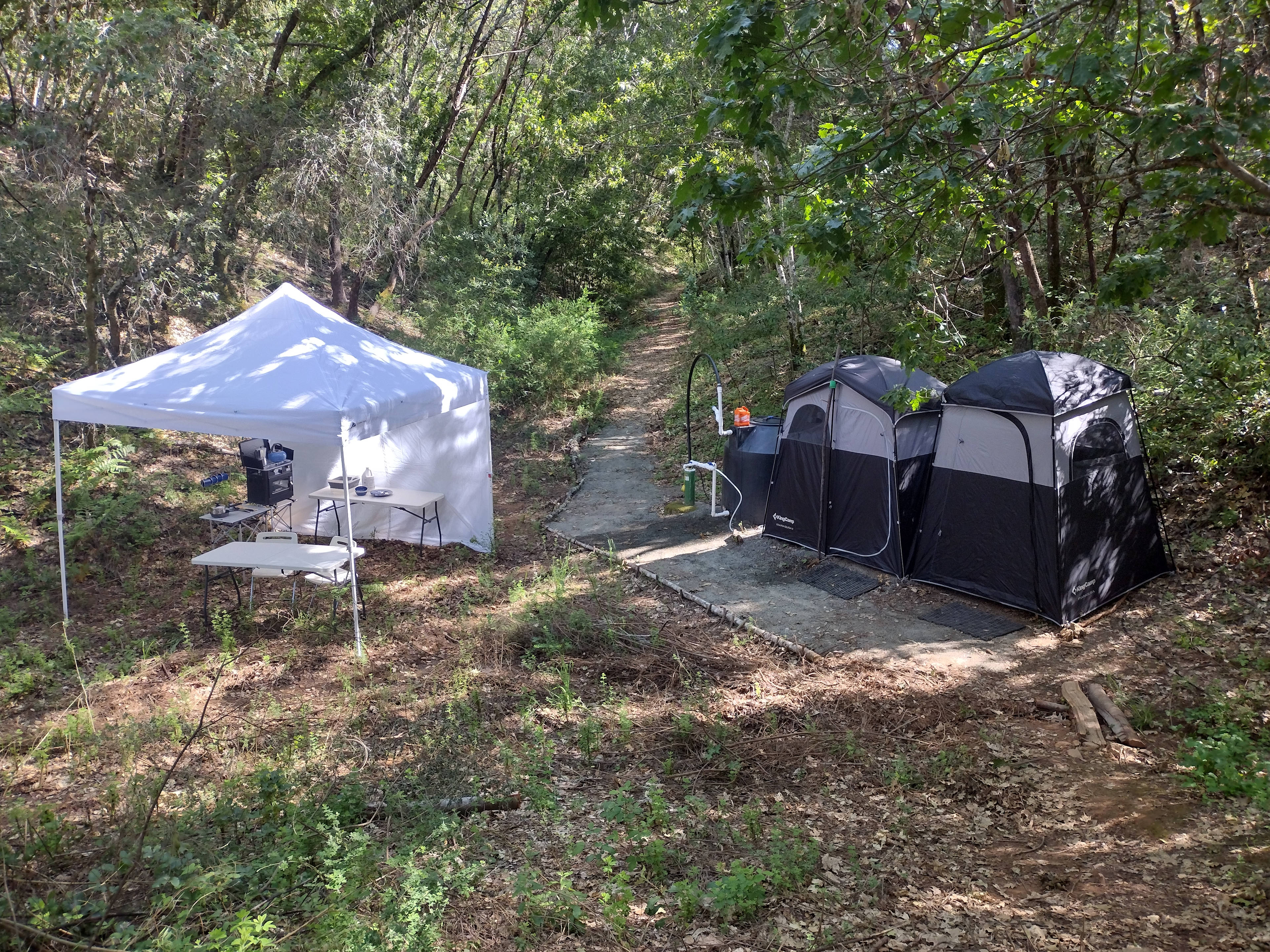 Hot shower, outdoor kitchen, picnicking, and fire pit are near the well. 
