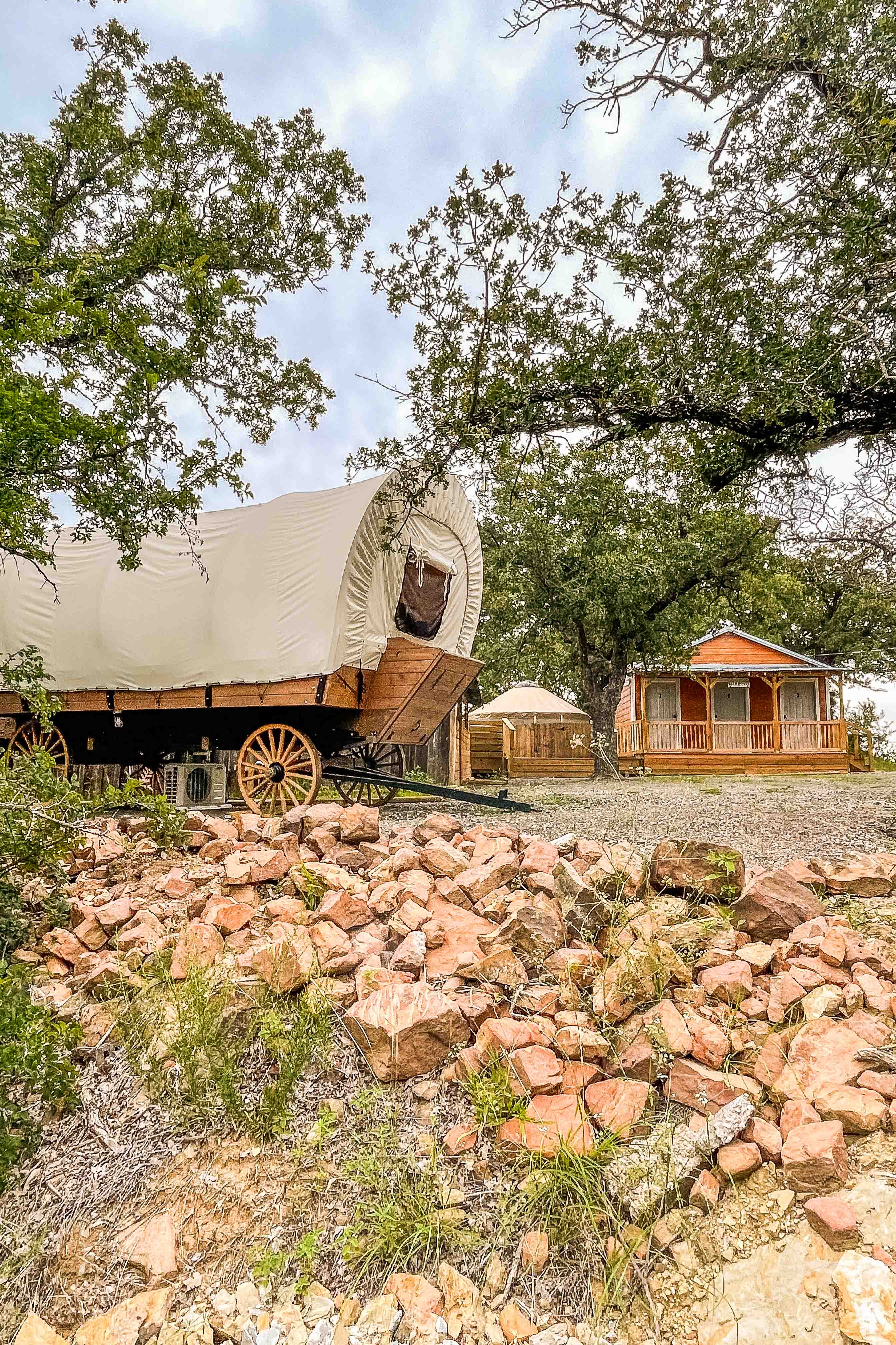 Conestoga wagon side exterior from another campsite 