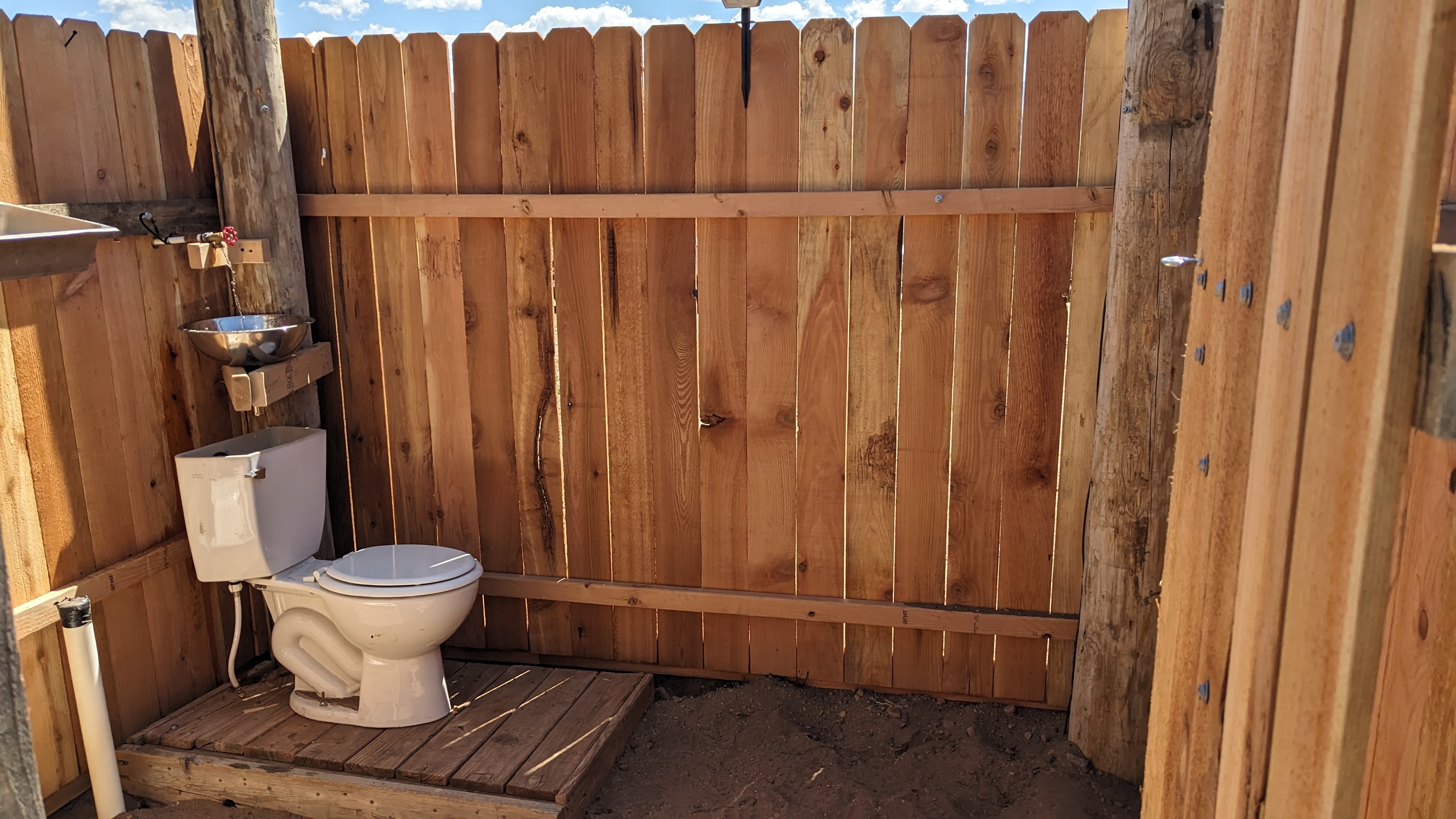 Toilet and sink area
Please conserve water