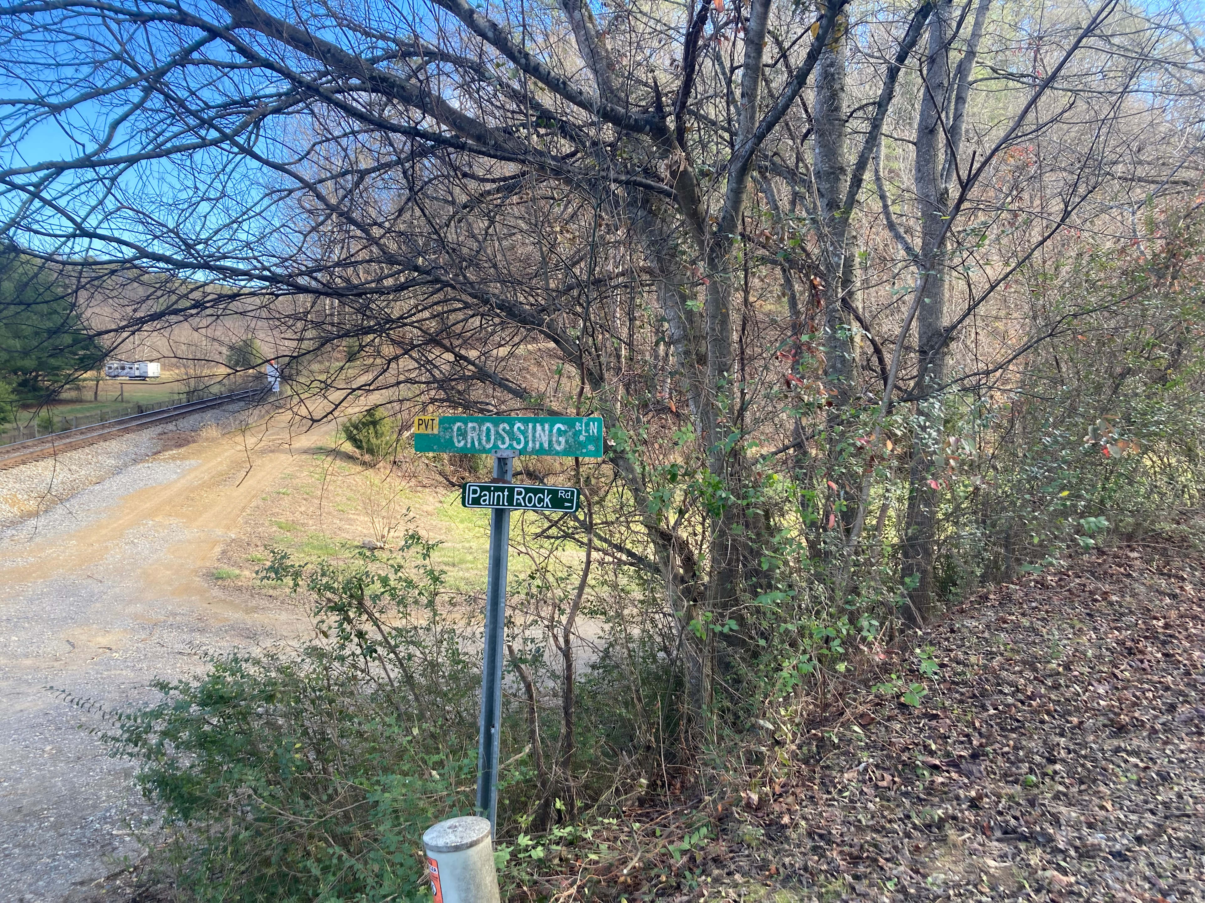 The road turns away from the railroad tracks after a short cruise alongside them.