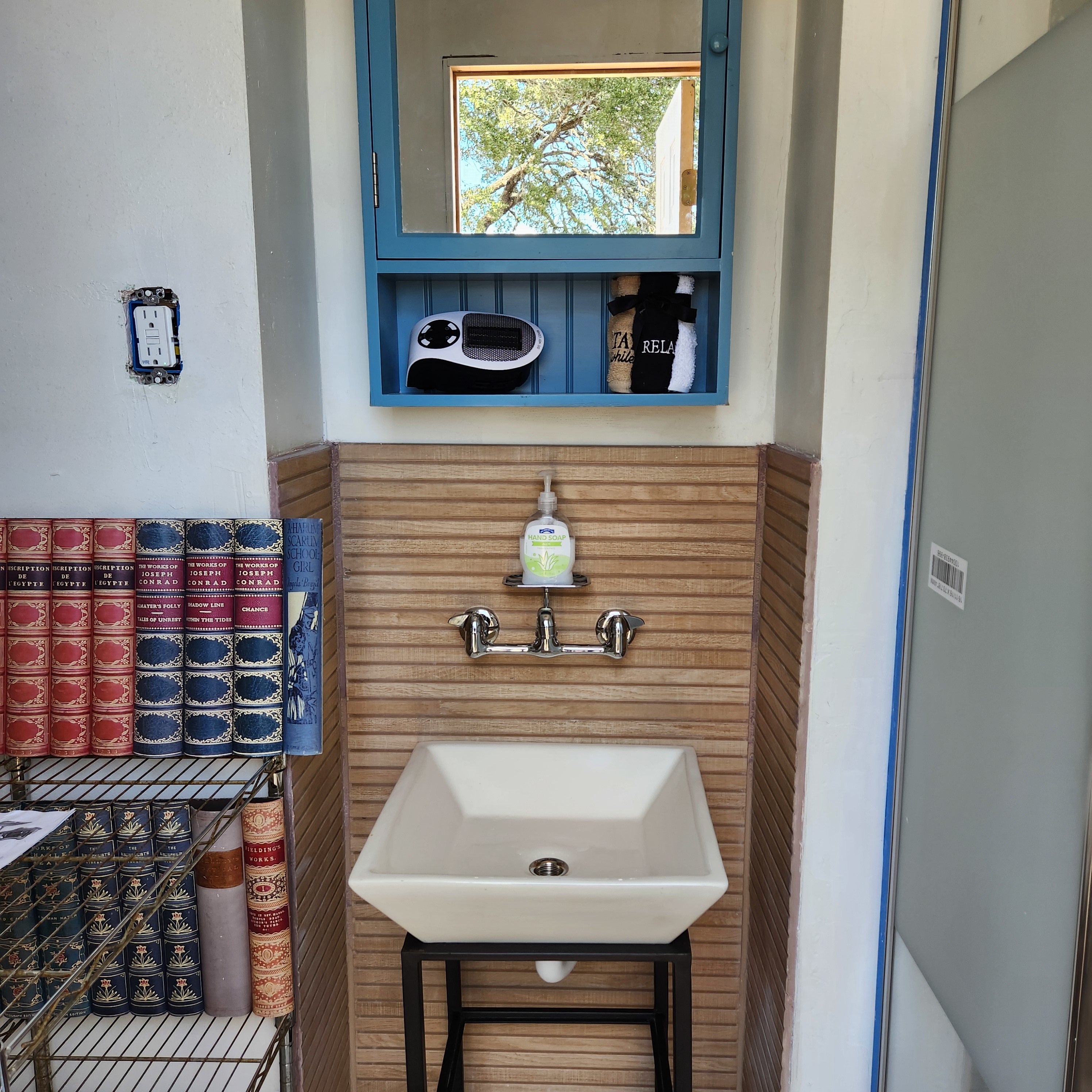 Bath house has running hot and cold water, hot shower with toiletries,  modern flush compost potty, heat and humidly control.