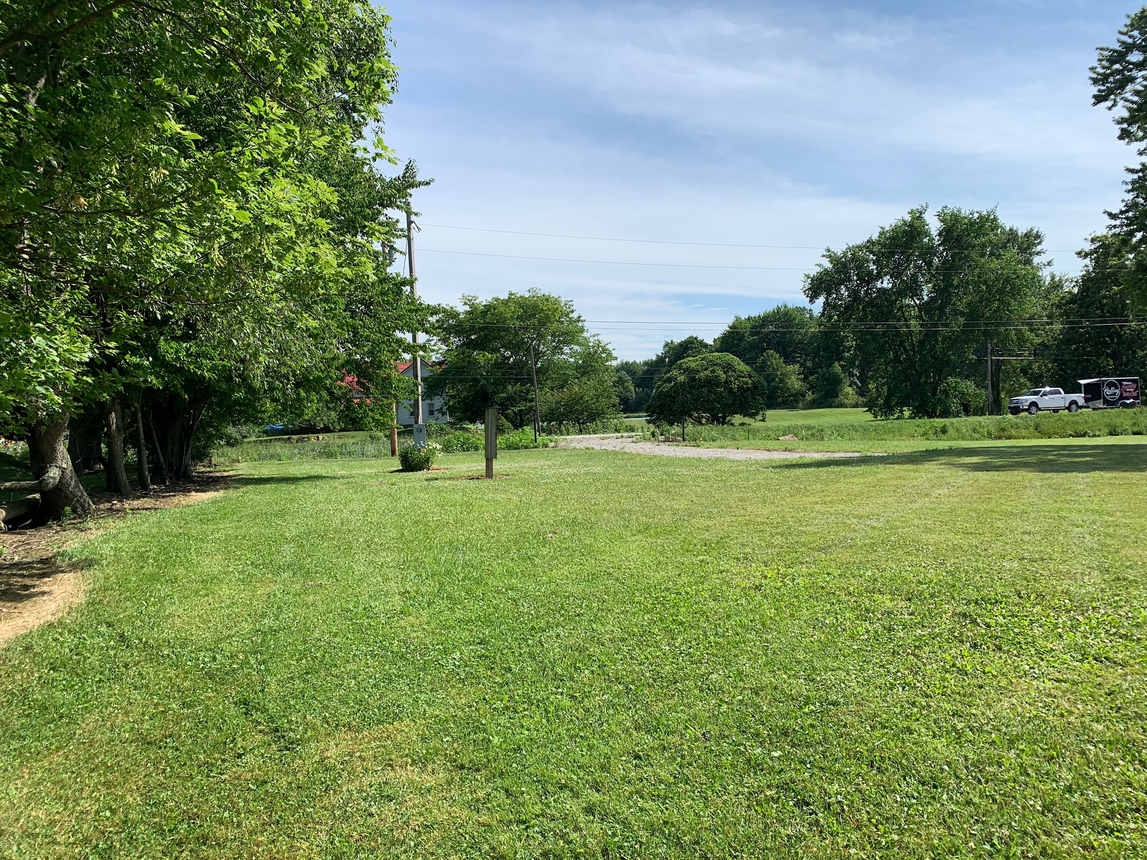 Looking South towards the main highway with the camping site driveway. 