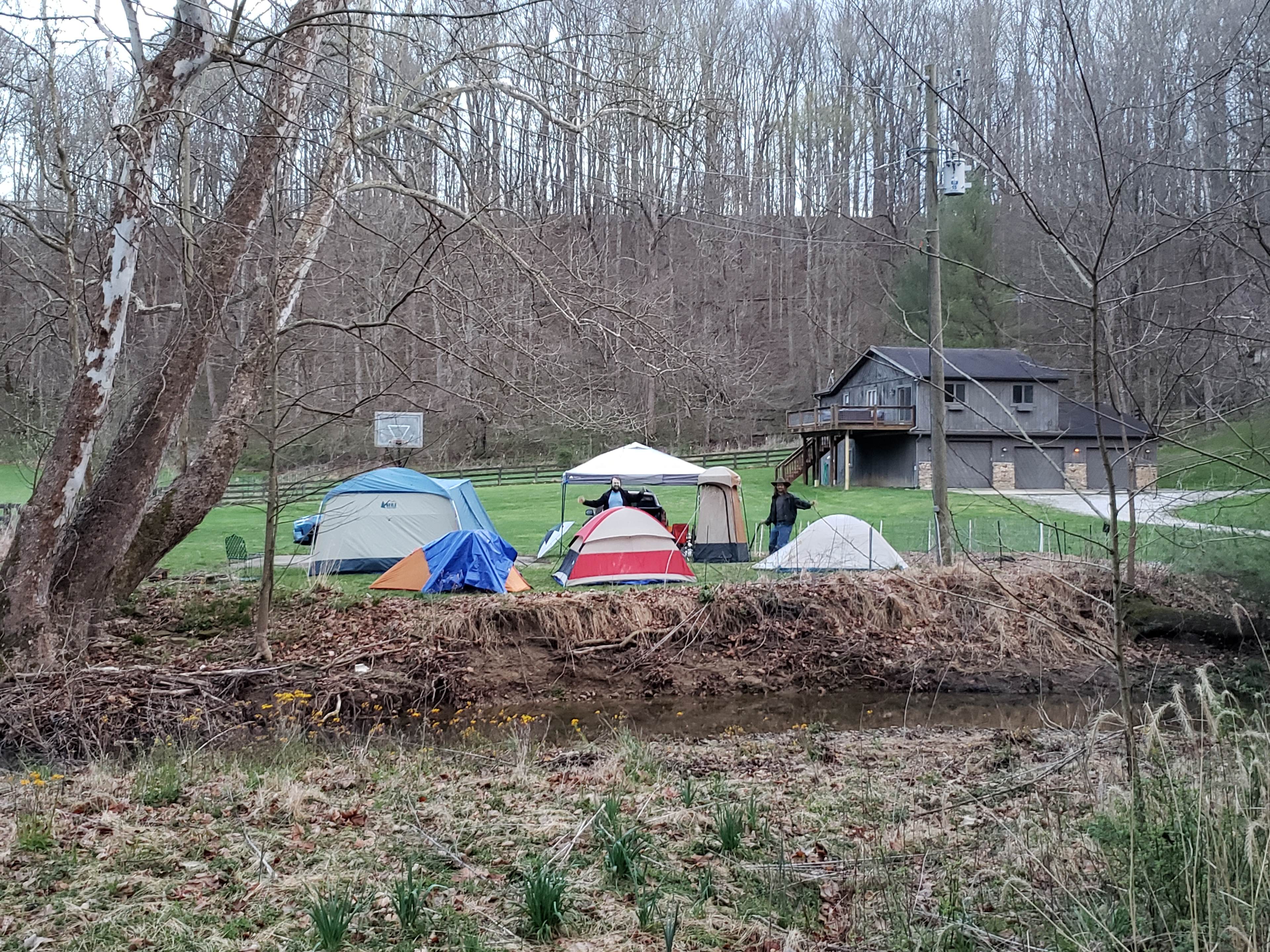 View of campsite with tents from opposite side of Kerr Creek