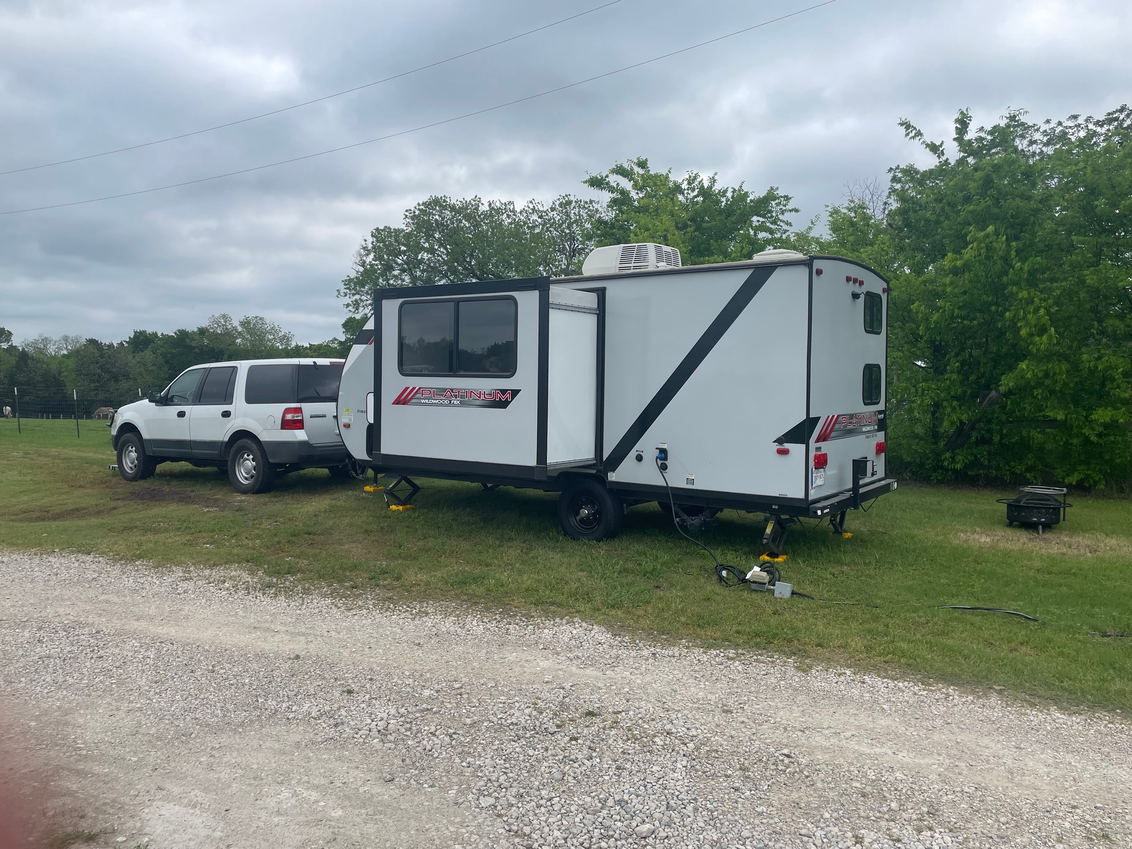 Easy pull in! Electrical connections and fire pit/grill too