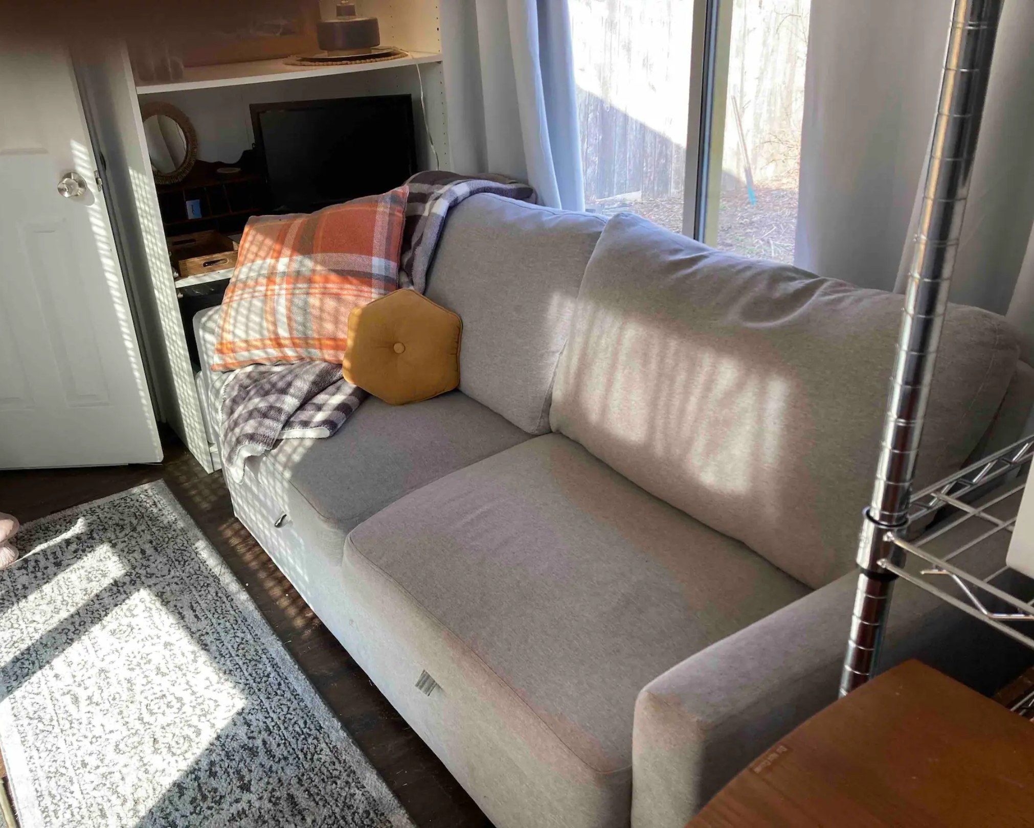 Comfortable convertible couch, living area