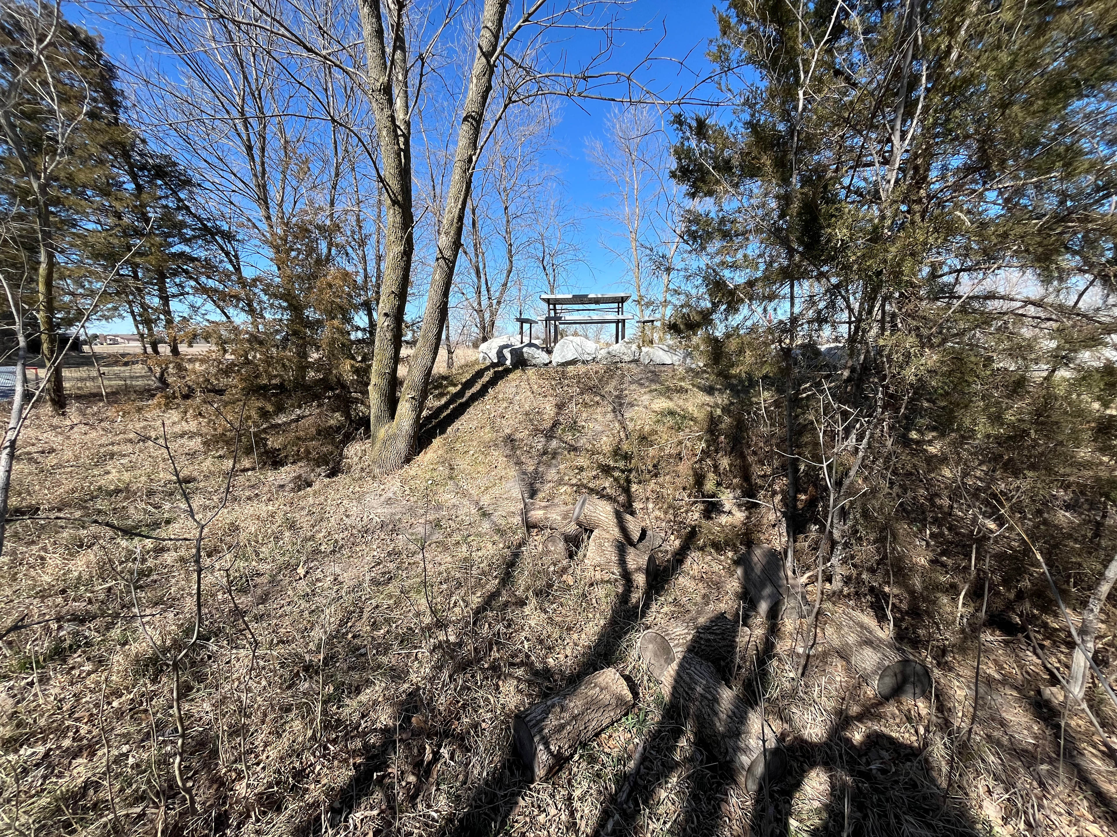 Here I am behind the gravel pad on the site. Picture taken in April.