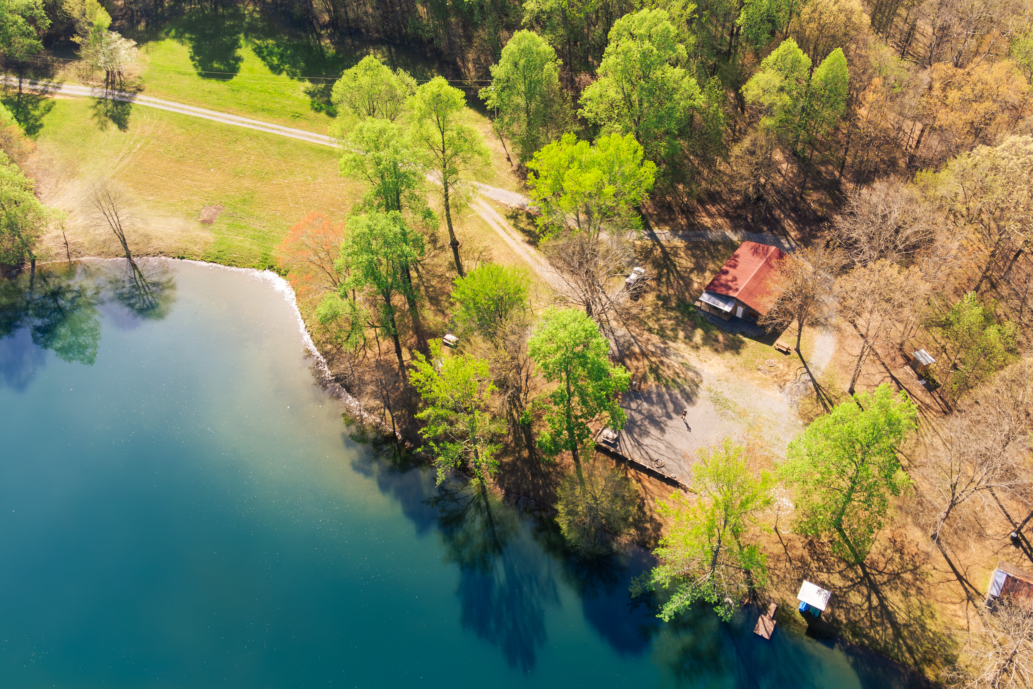 Aerial view of the land, showing the cabin and two RV sites.