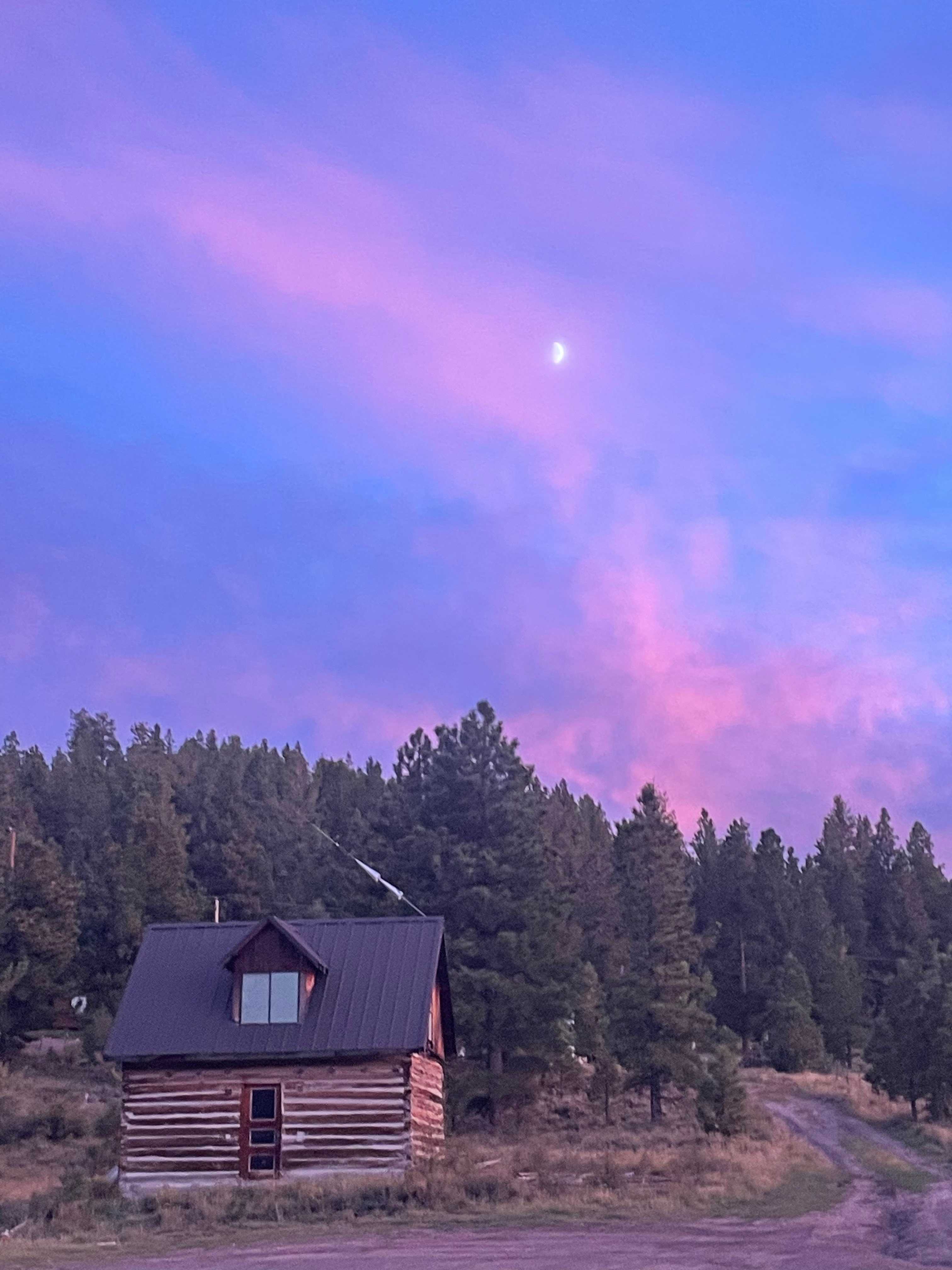 Cotton Candy Skies in the summer. Building shown here is unoccupied and is at the end of our property. The camping site is just in front. 