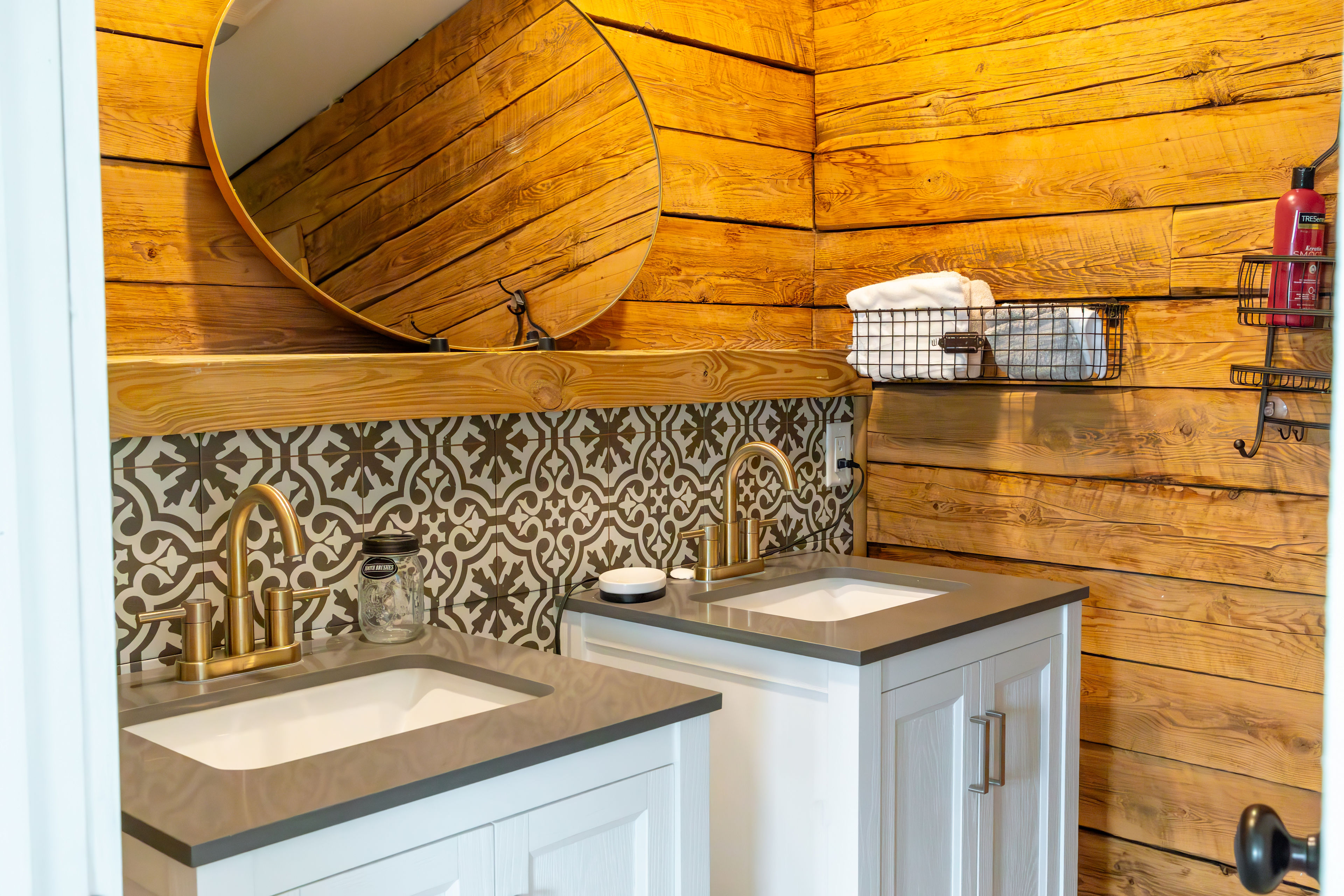 Each cabin has a bathroom. The Queen and Ace cabins have double sinks, while the King and Jack cabins have a single sink with spacious counters. 