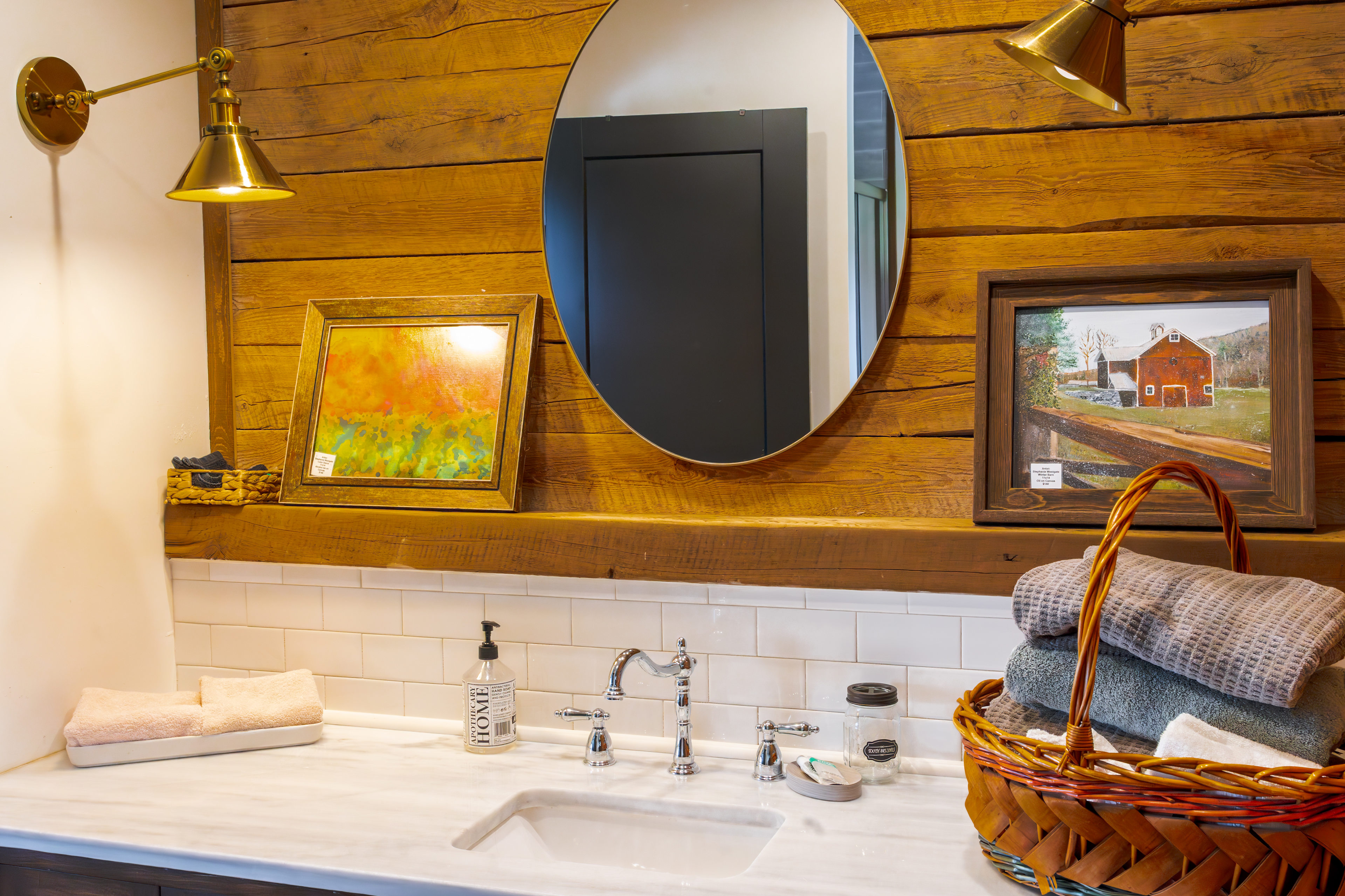 Each cabin has a bathroom. The Queen and Ace cabins have double sinks, while the King and Jack cabins have a single sink with spacious counters. There is even artwork for sale in the cabins! 