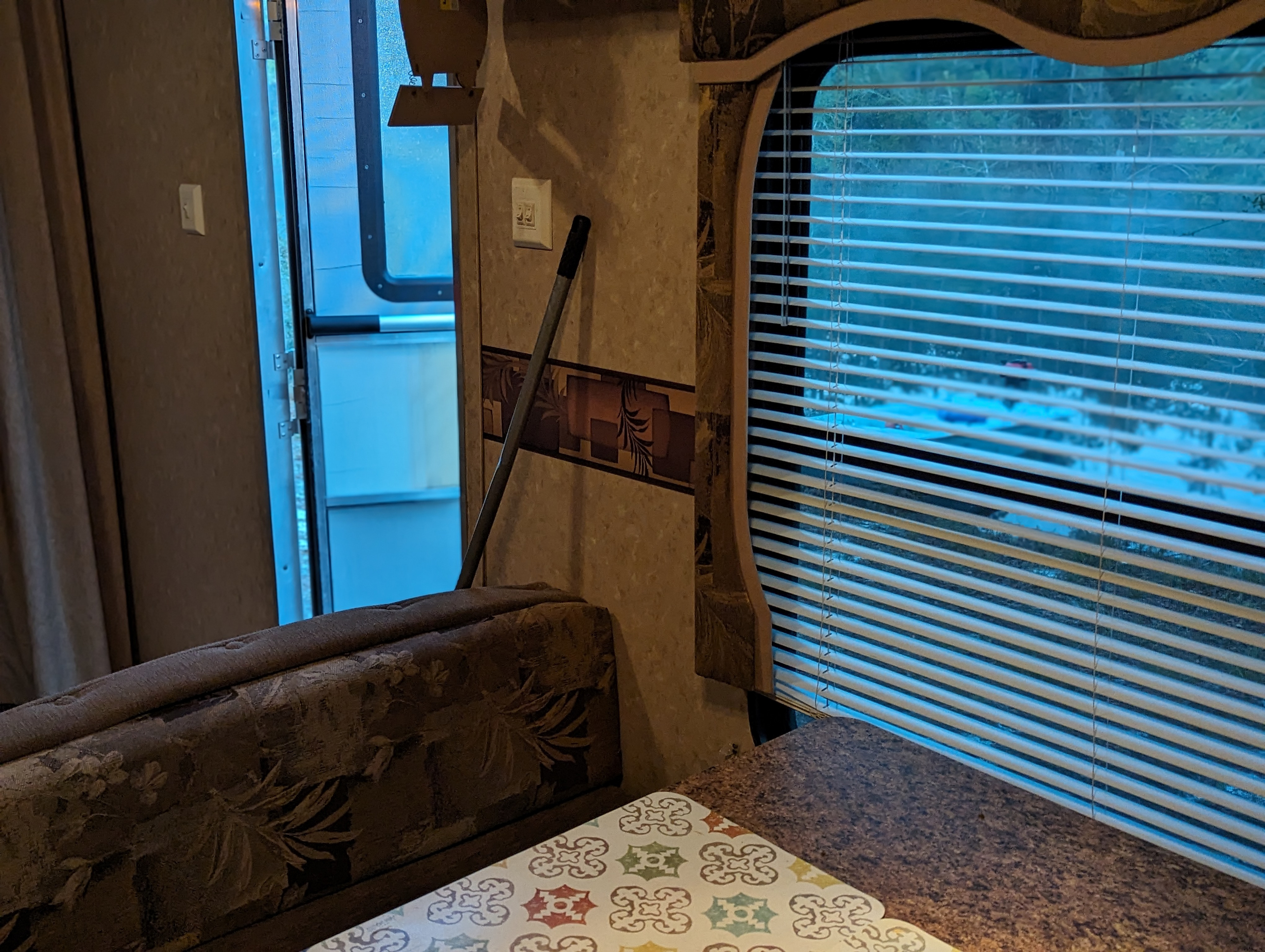 Inside table next to the door, seats four. 