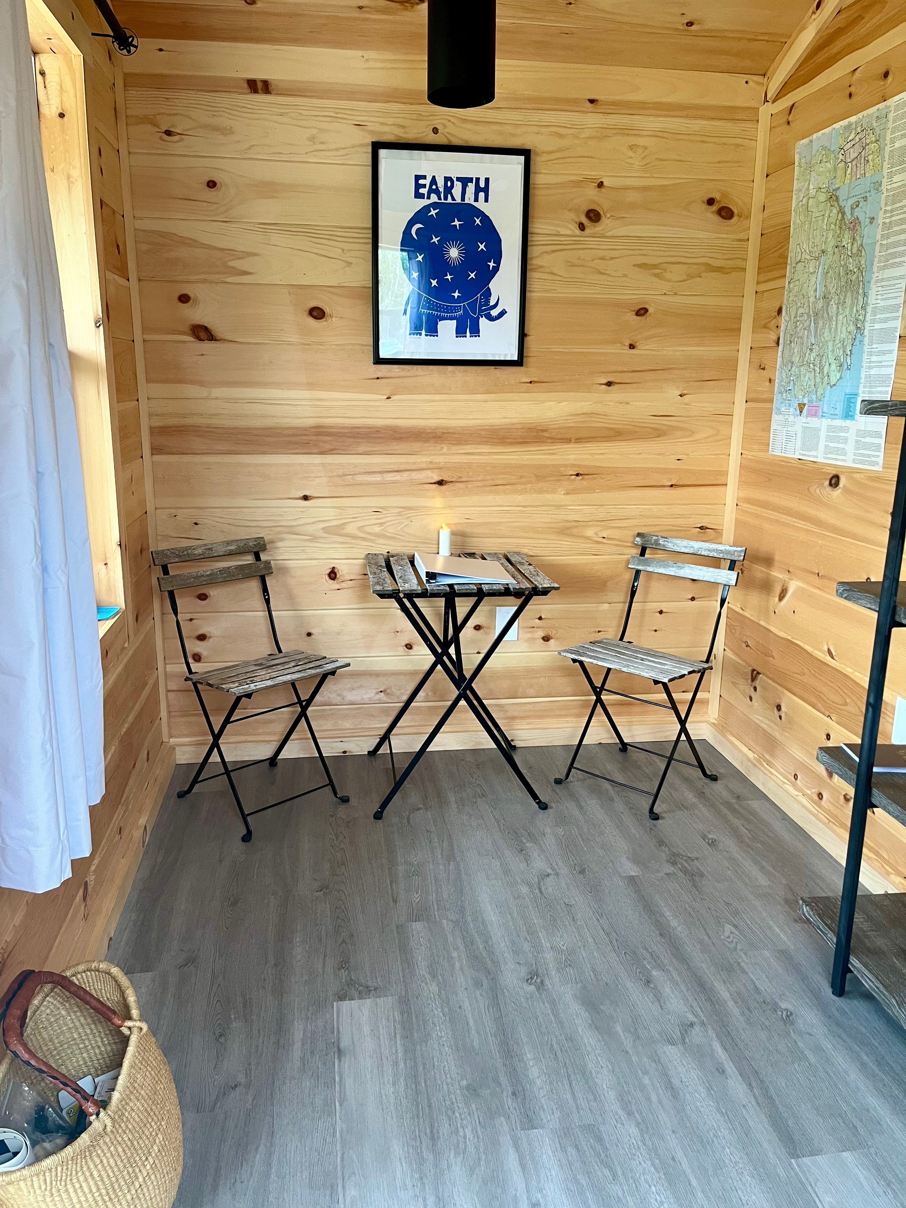 Indoor dining area with a basket full of games.