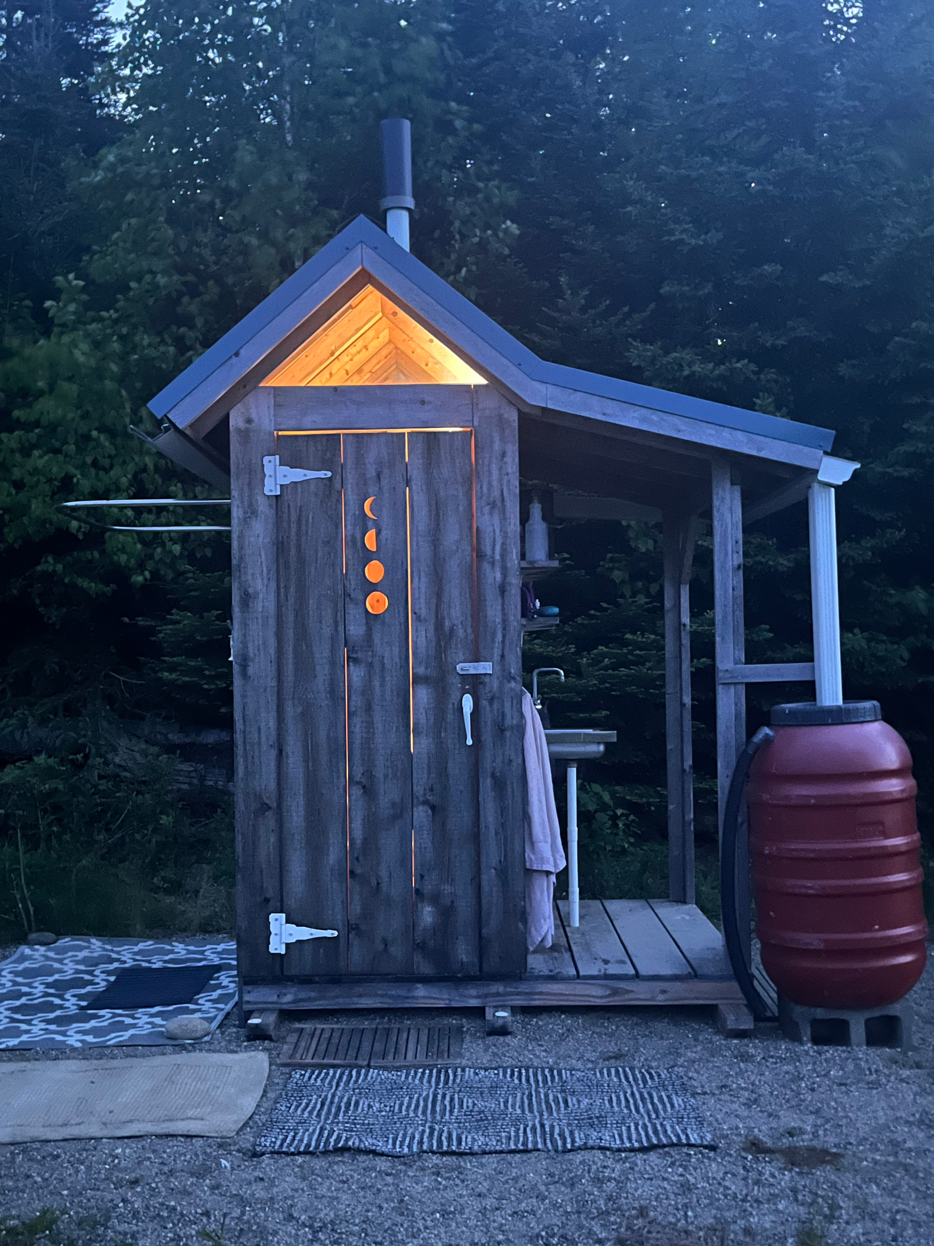 Battery-powered lights in the outhouse for when it gets dark