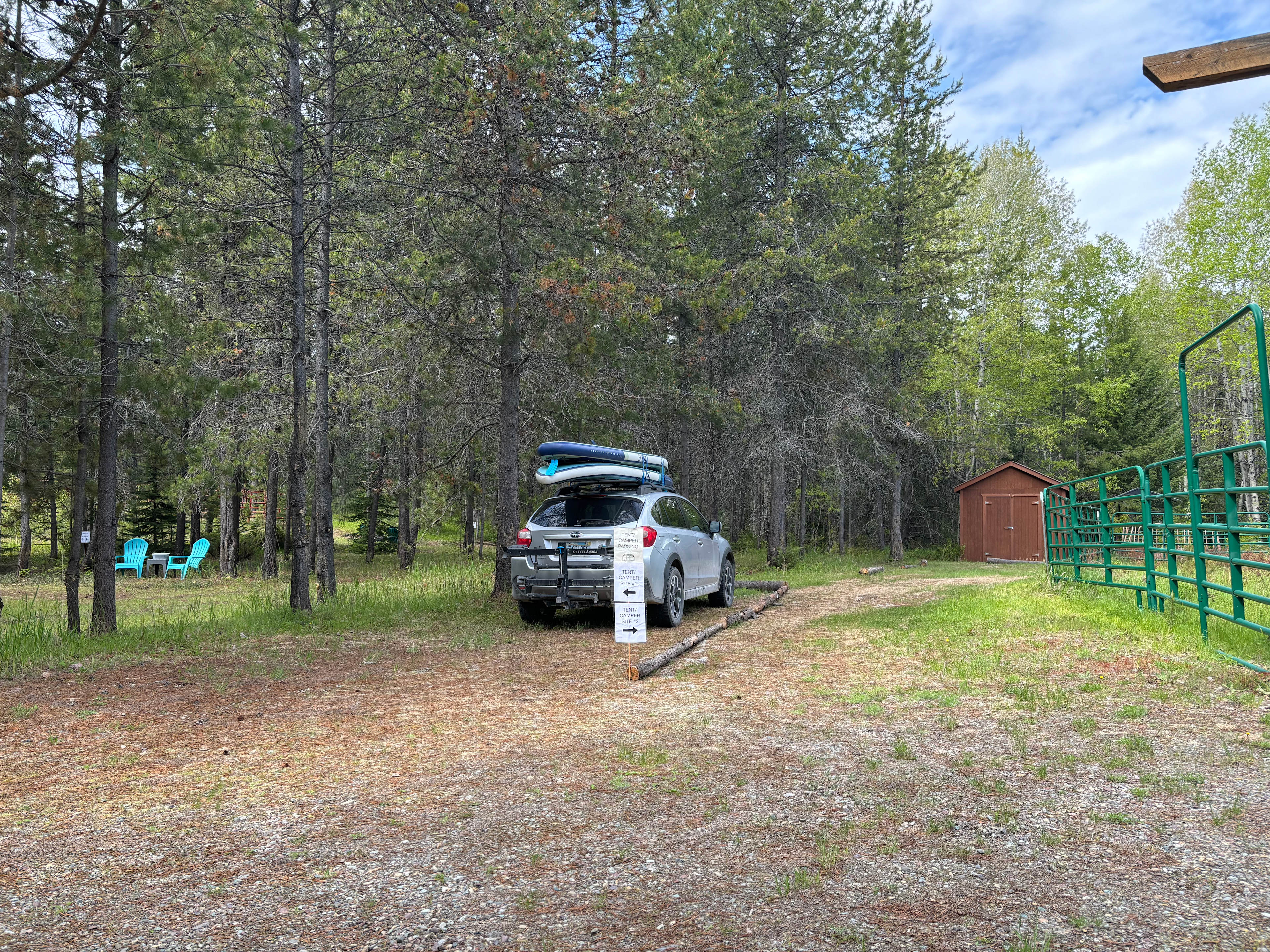 Site #2: park on right side of divider closer to shed. Your campsite will be to your left, about 20 feet from where you park. 
