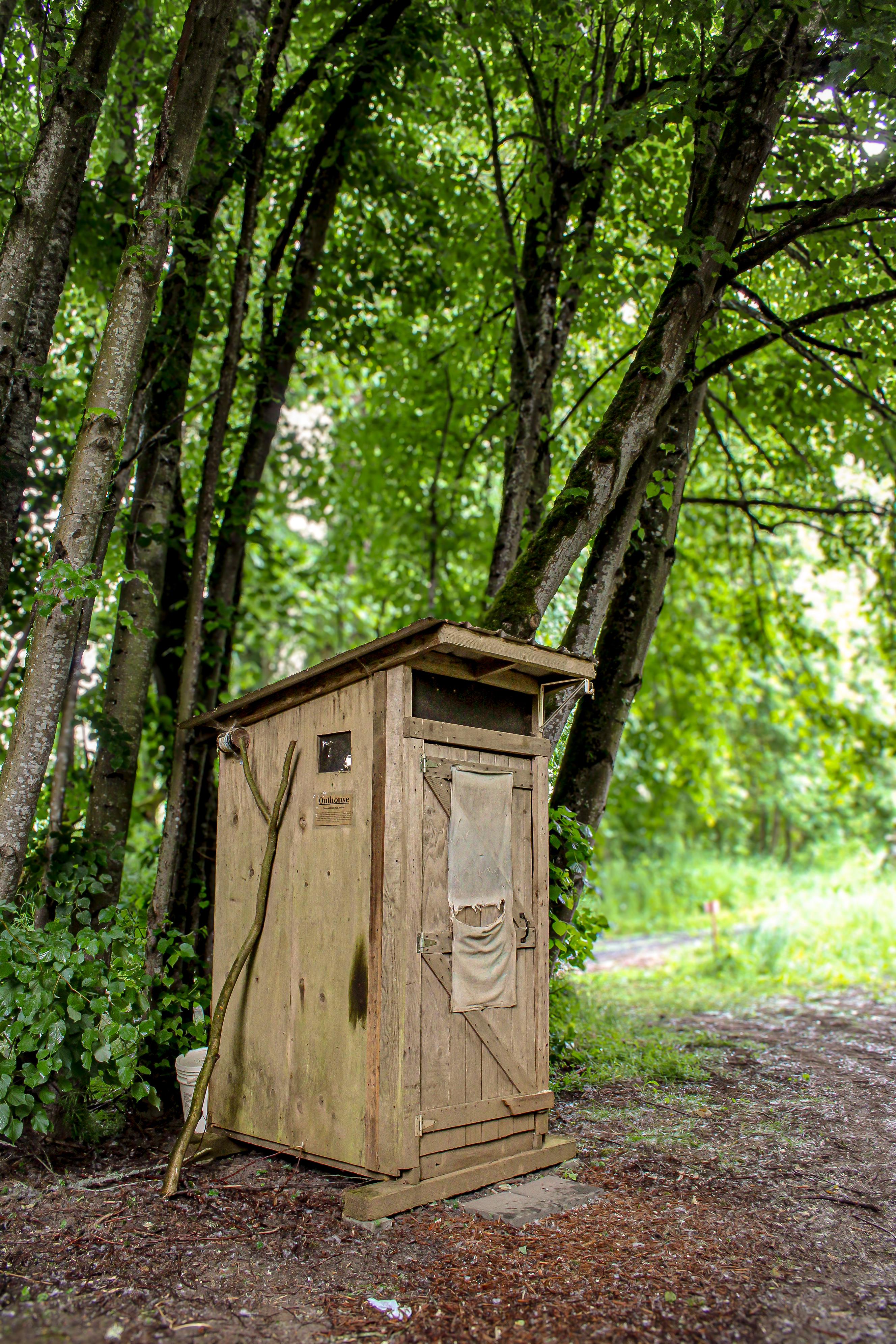 An outhouse for all your needs w/sawdust for those special moments