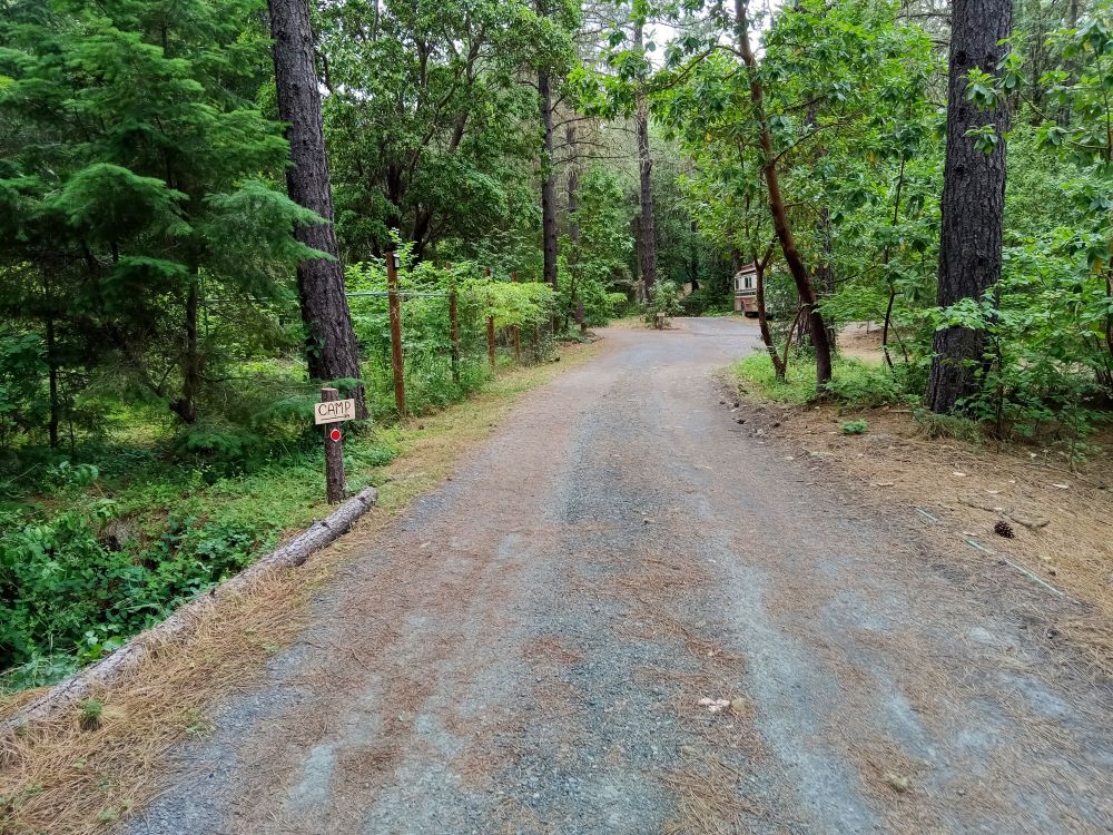 Entry drive on to land... Turn right in front of bus to get to camp.