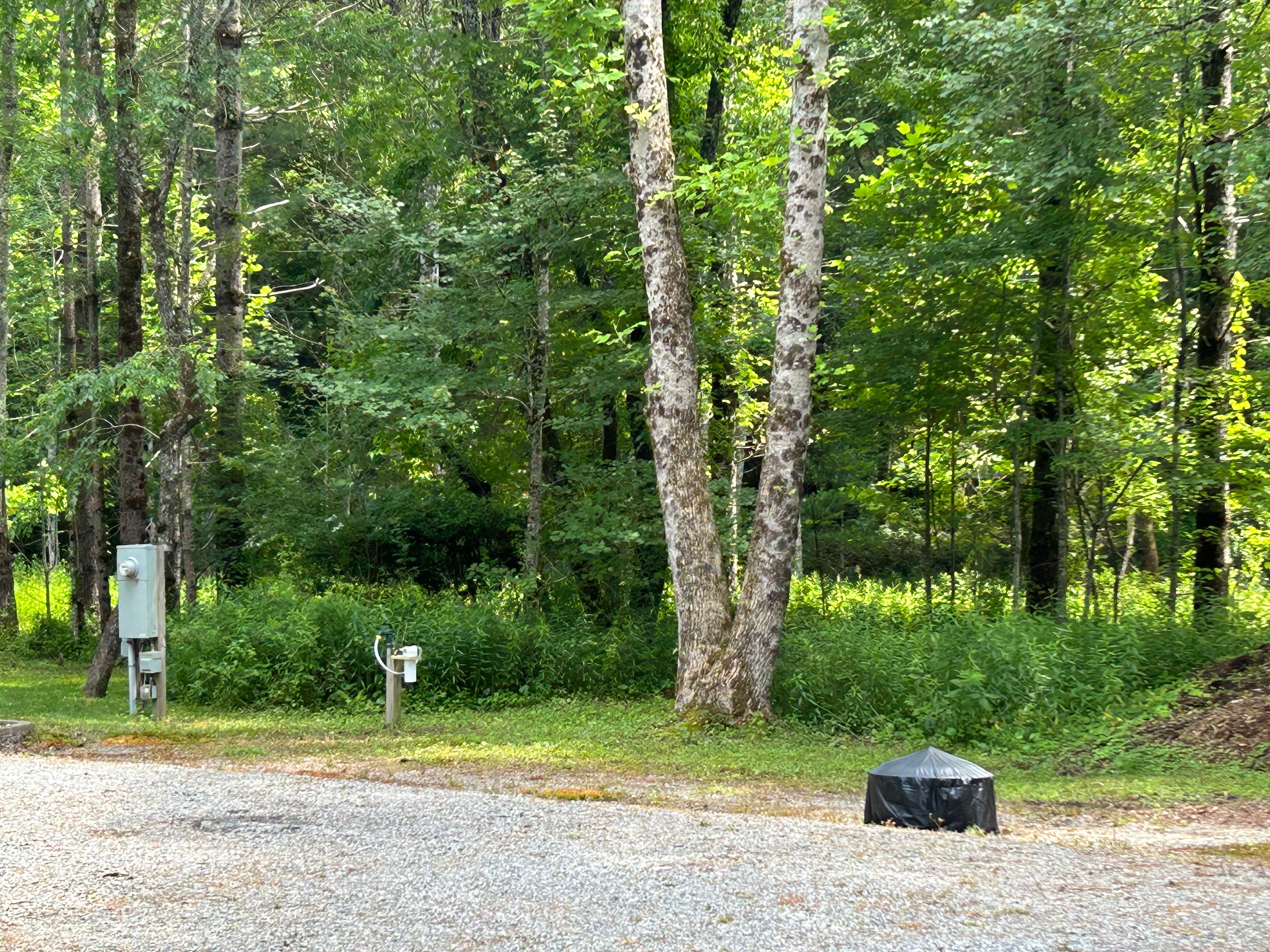 Level parking pad with all services easily accessible.