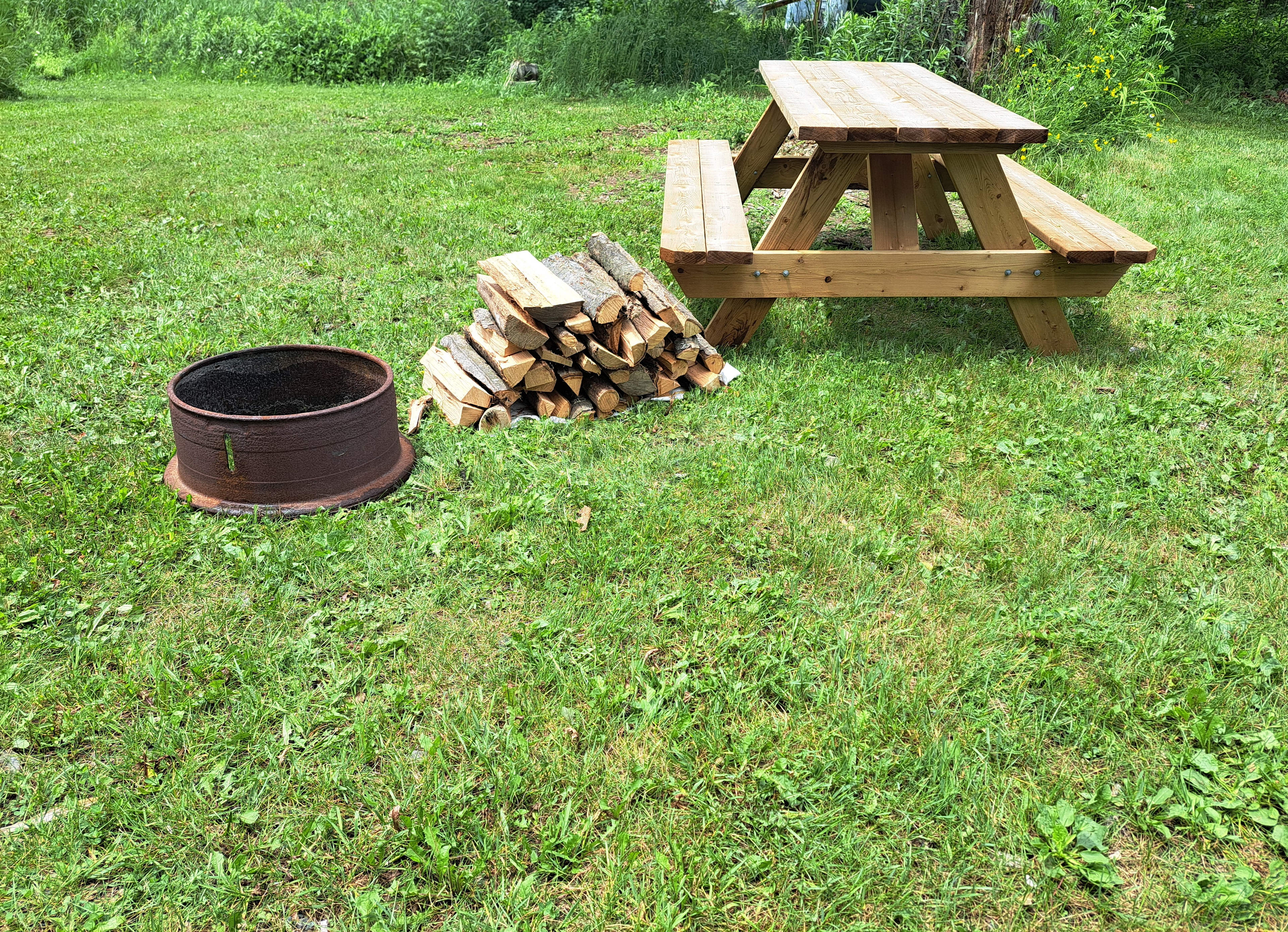 We have hardwood bundles for sale and portable fire rings of various sizes.