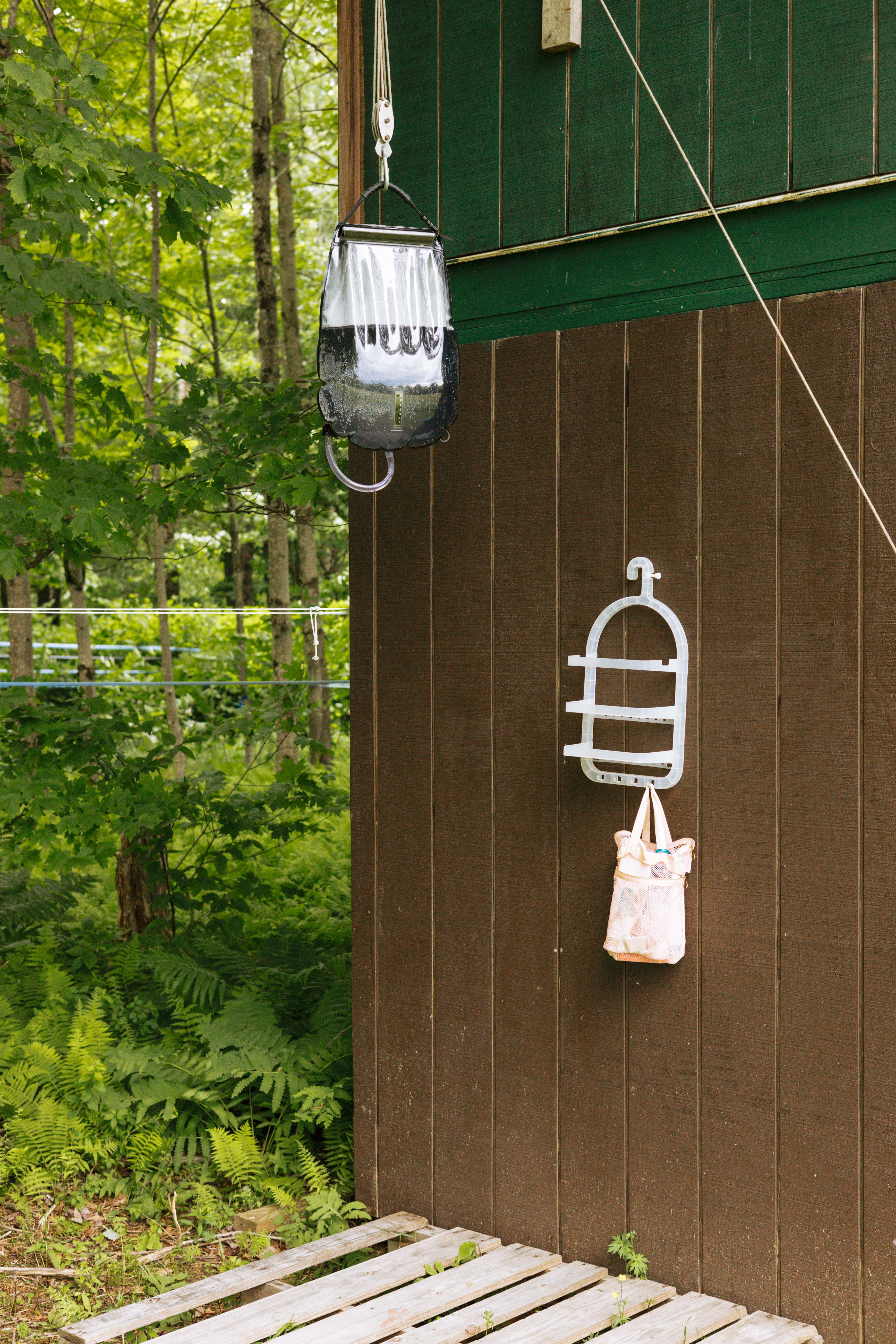 The outdoor shower located toward the back of the meadow and also facing the back for some privacy. 