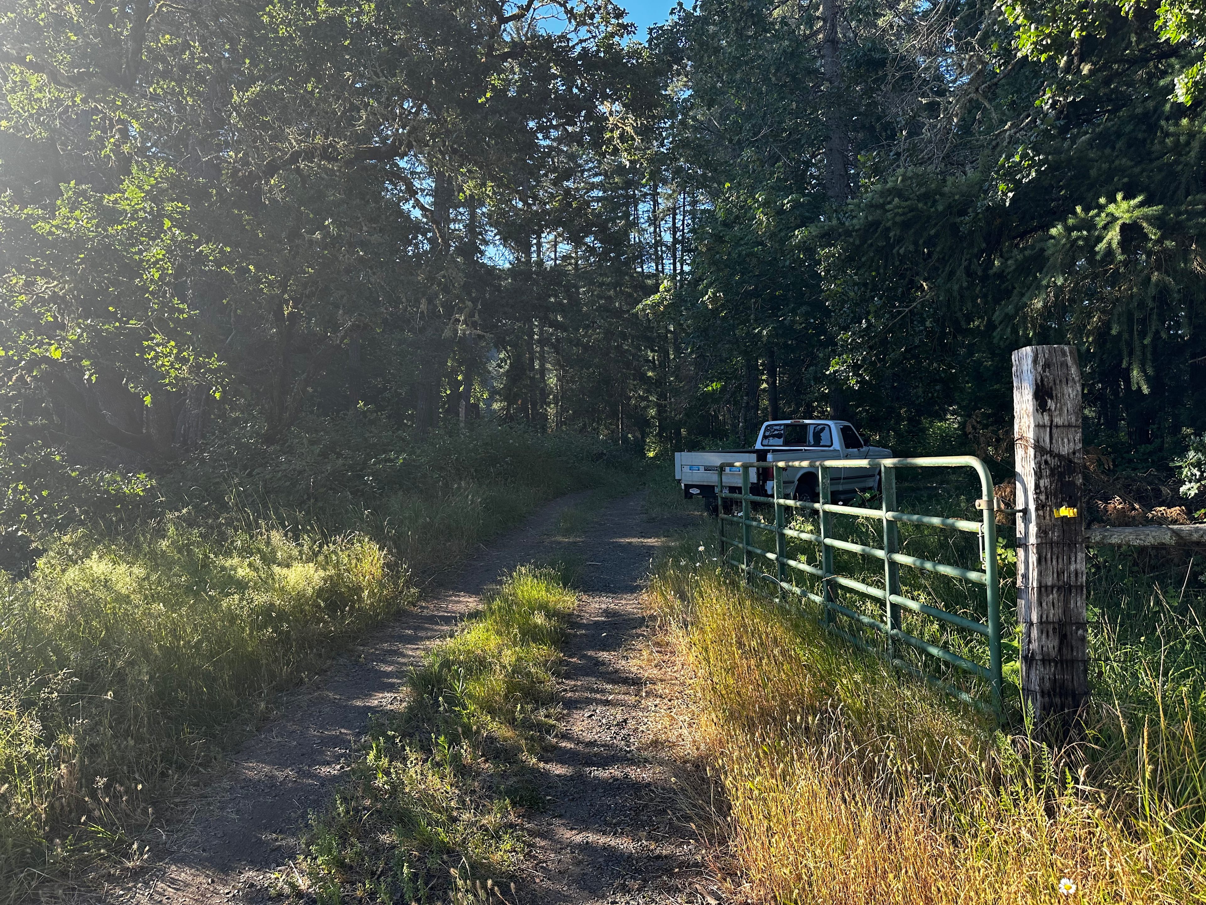 When you arrive at this gate you will follow the direction of the white truck to your site.  