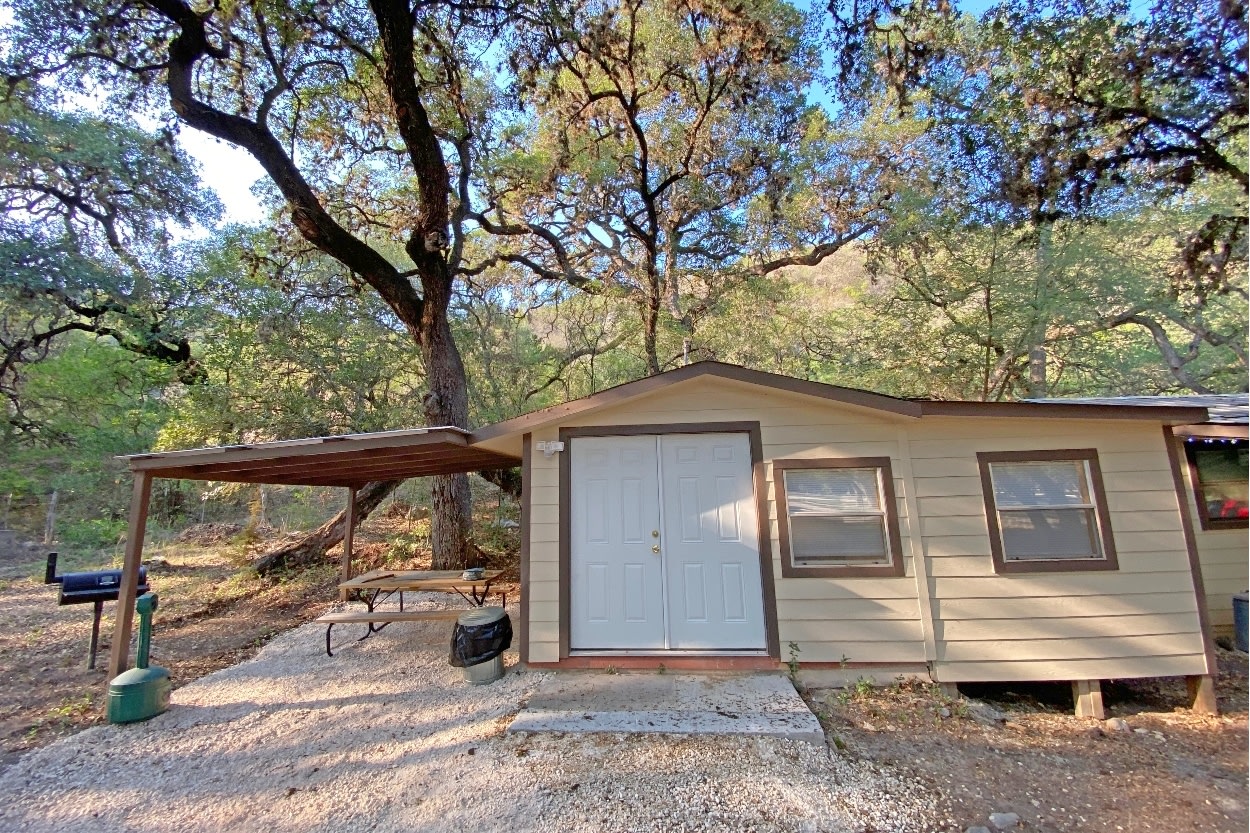 Front pic of Cabin 3. This view doesn't show it but there is the little personal pool to the left of this picture.  