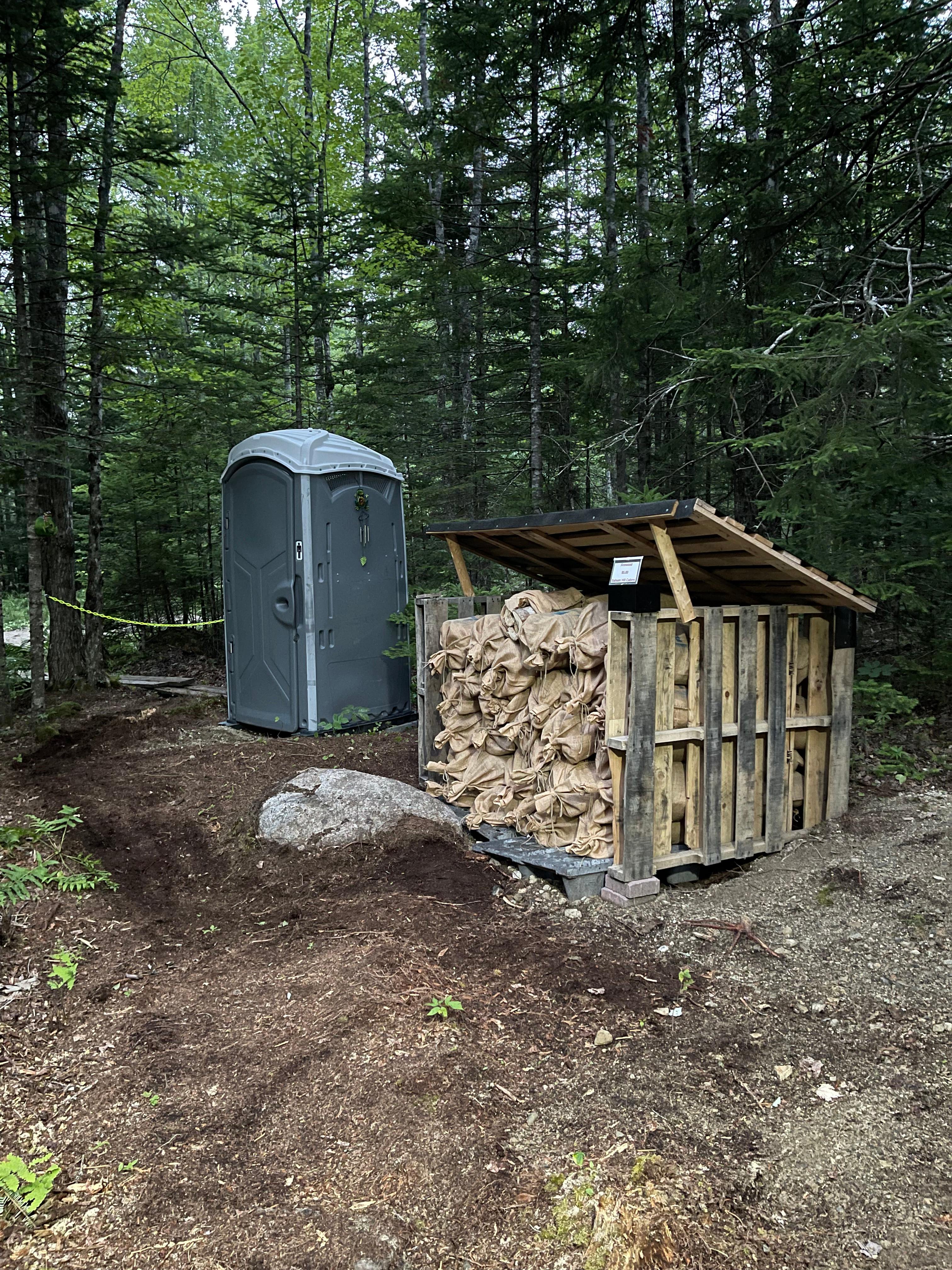 Firewood 🪵 and Outhouse