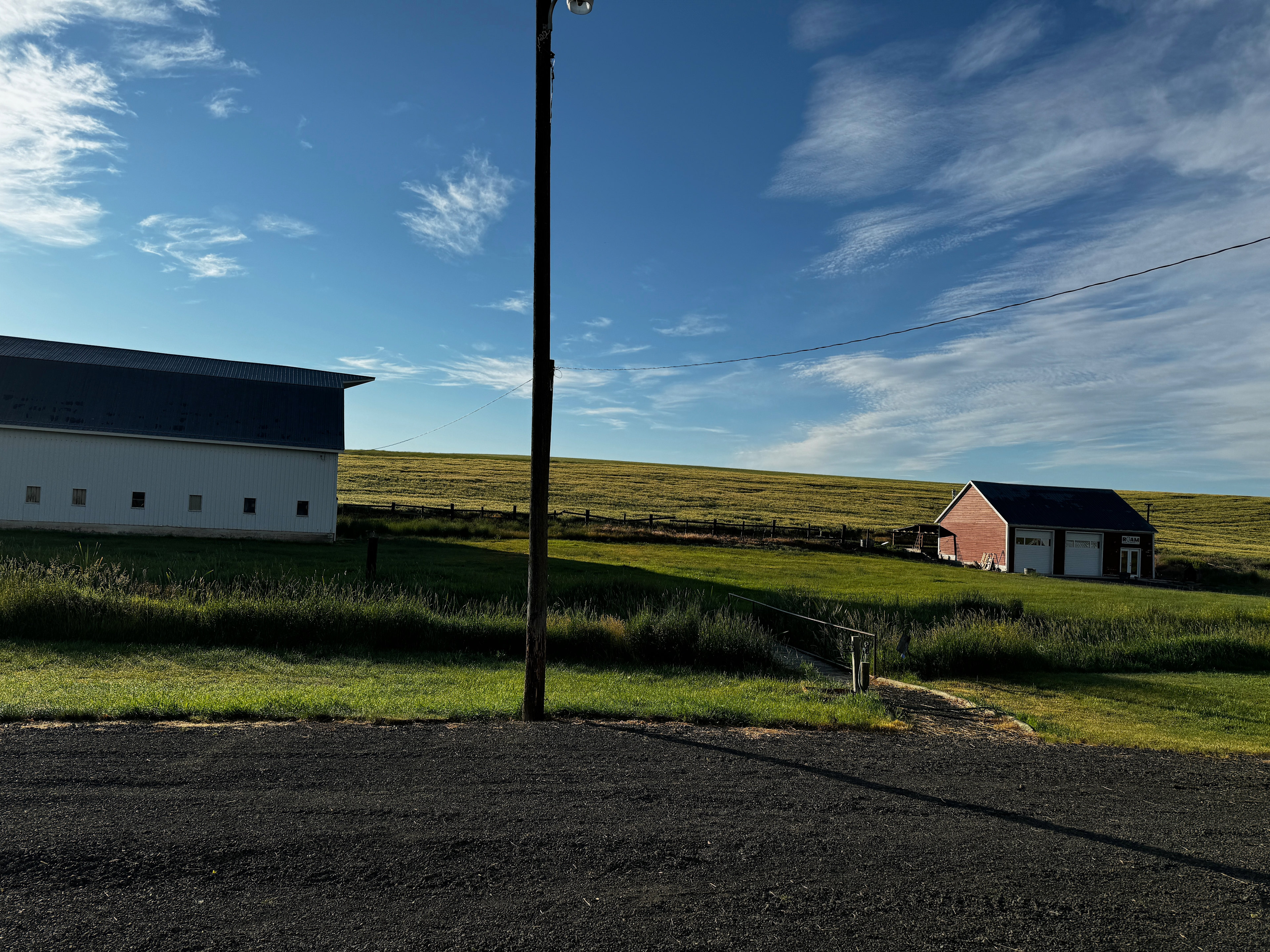 The idyllic pasture where you could set up camp with the coffee roastery for fresh morning brew on the right.
