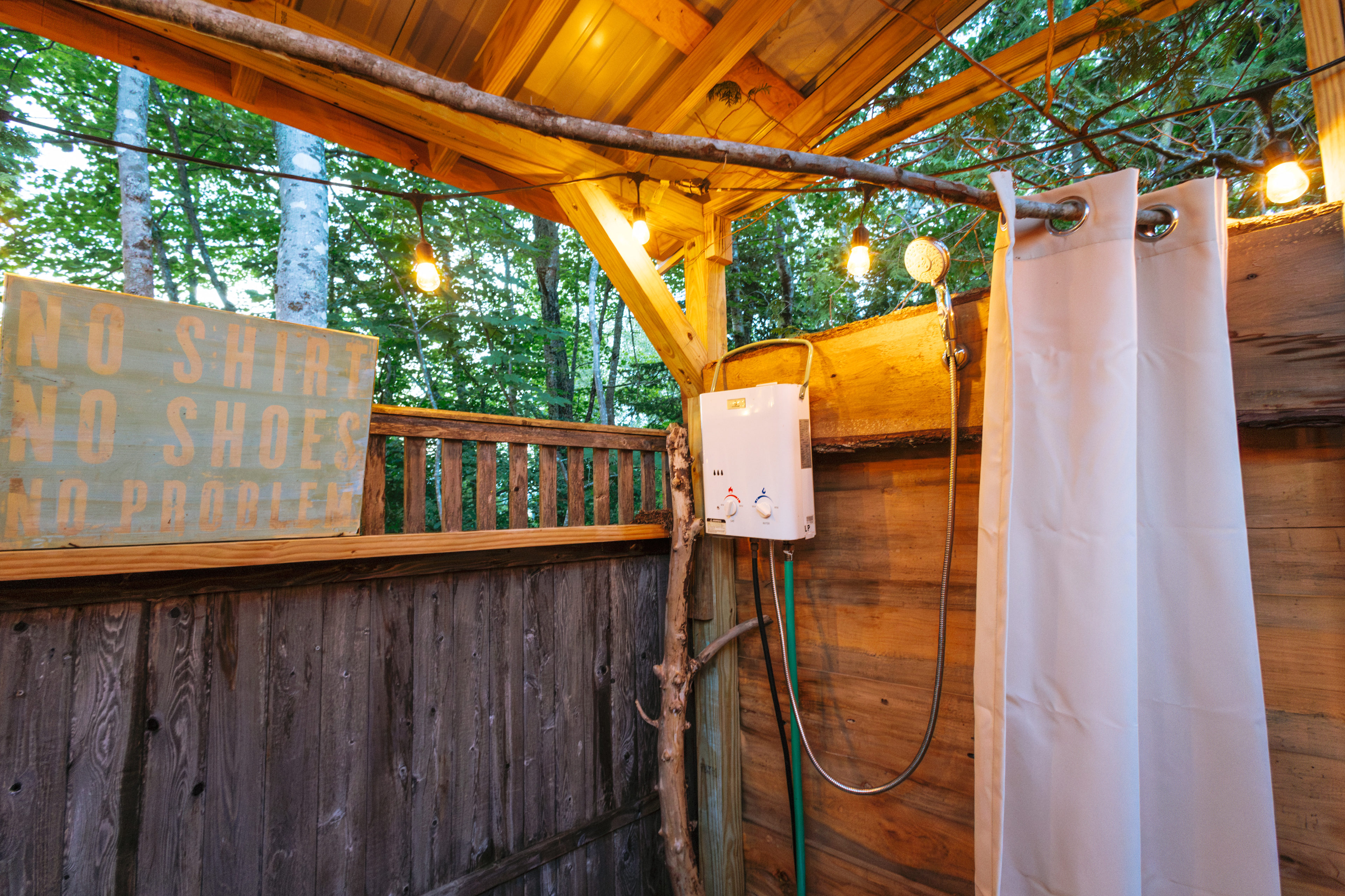 The bathroom has a hot shower with great pressure. 