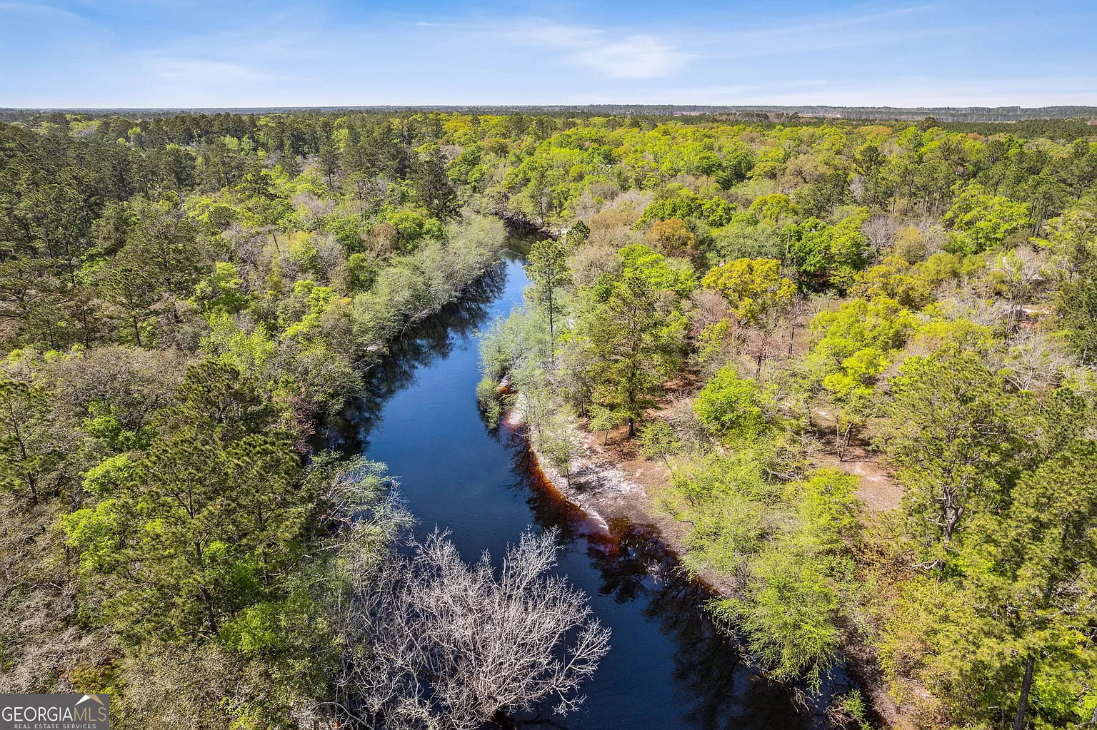  Arial Shot around our property. Surrounded by nothing but trees on both sides of the river!  