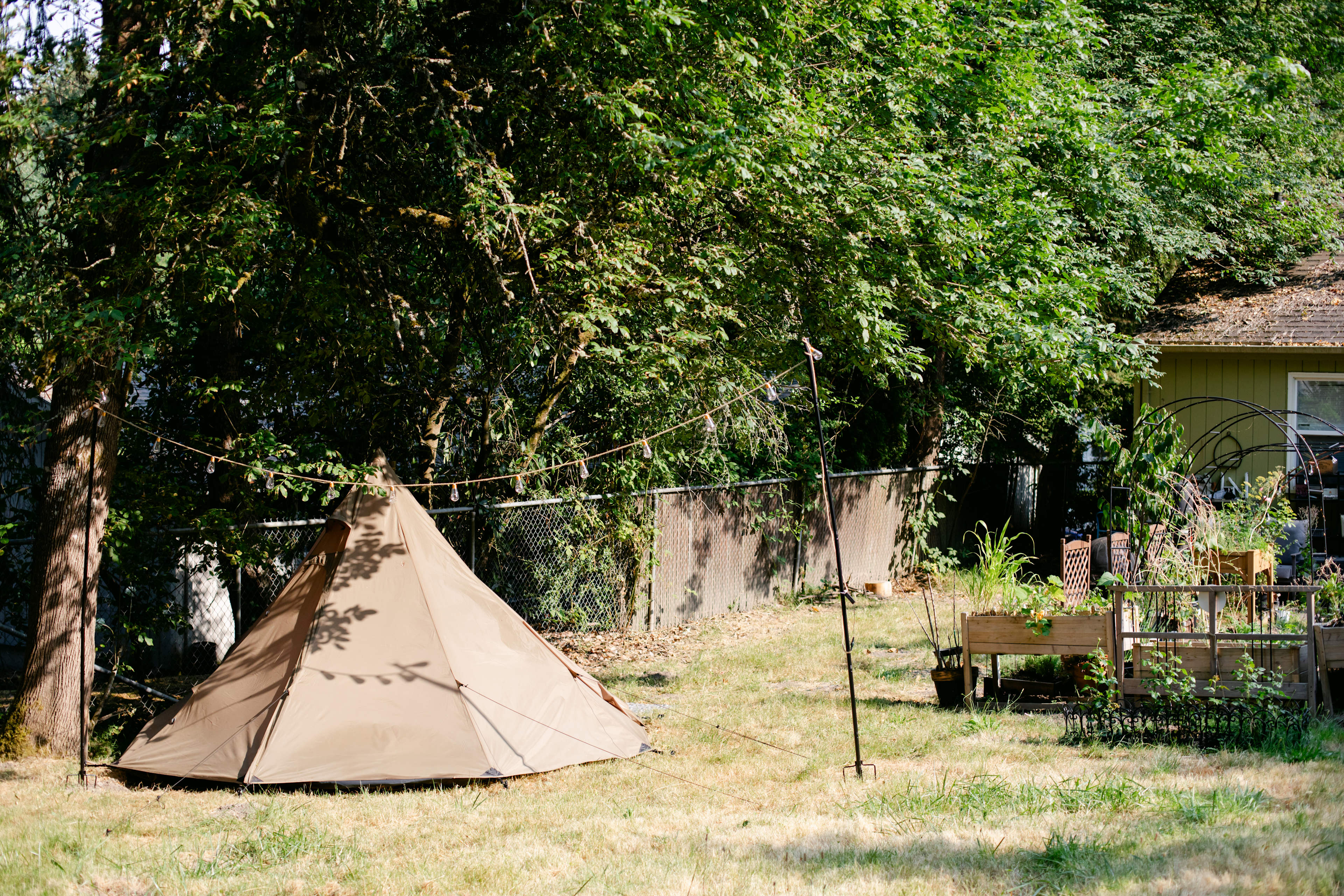 A view of the tent in proximity to the home.