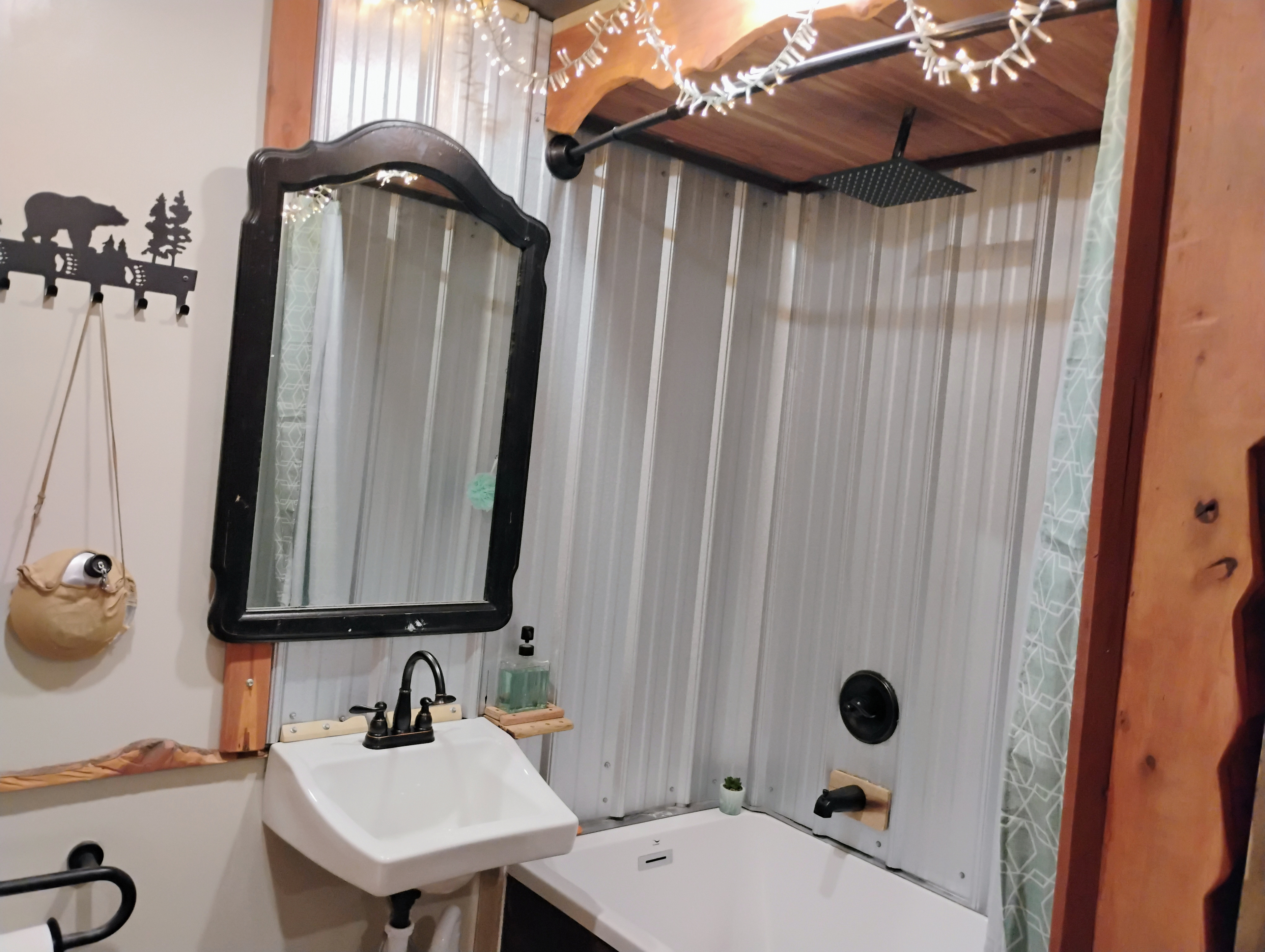 22 inch extra deep soaking tub with rainfall shower head.