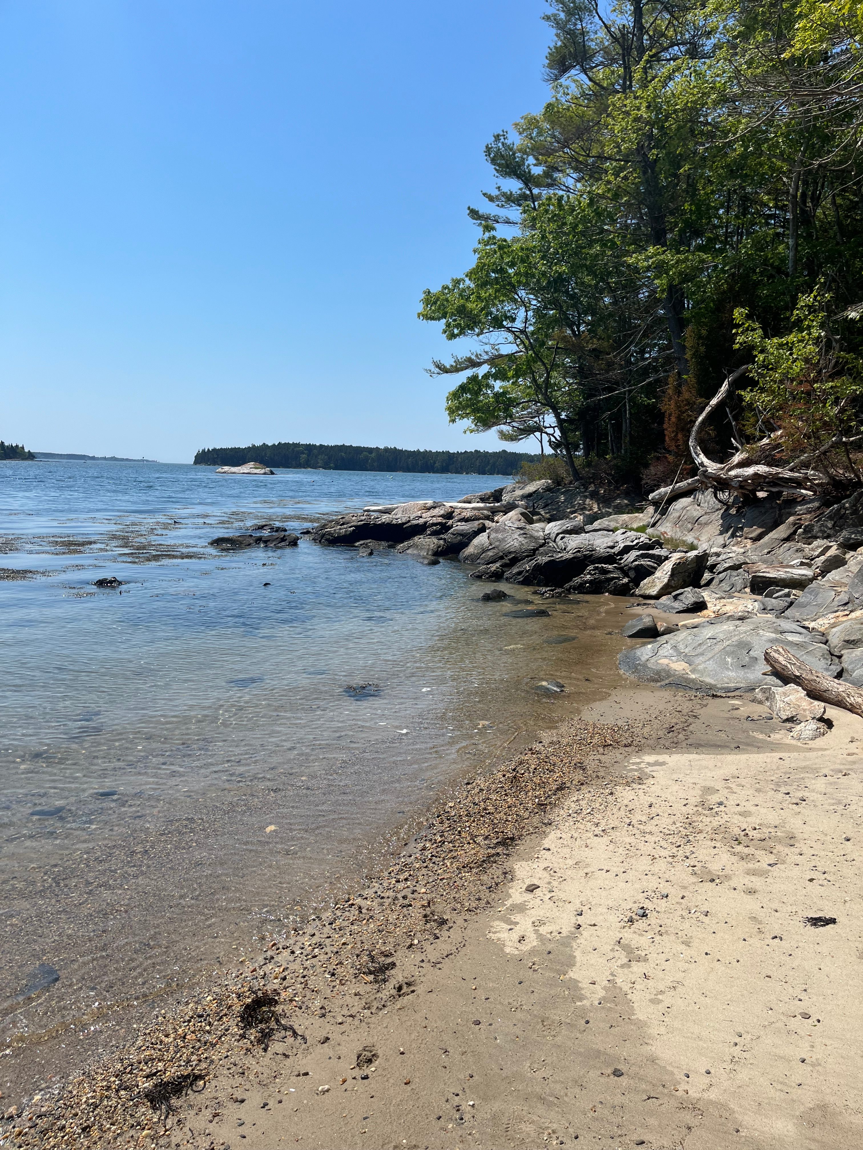 Private beach with sandy area at low tide- a bit of climbing over rocks is needed to get there!