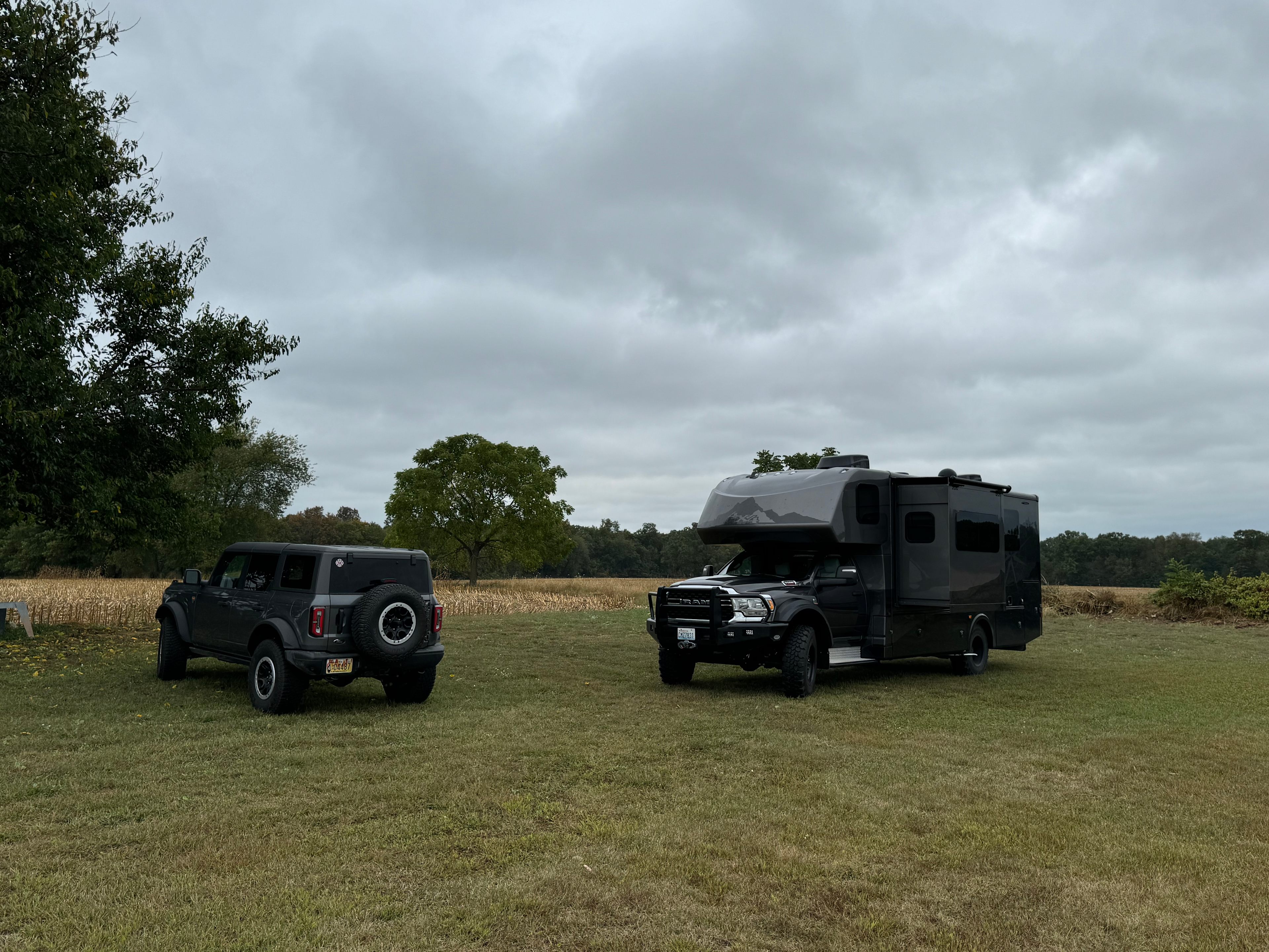 Grass is firm and relatively level.  Open to the sun for those with solar systems like ours.