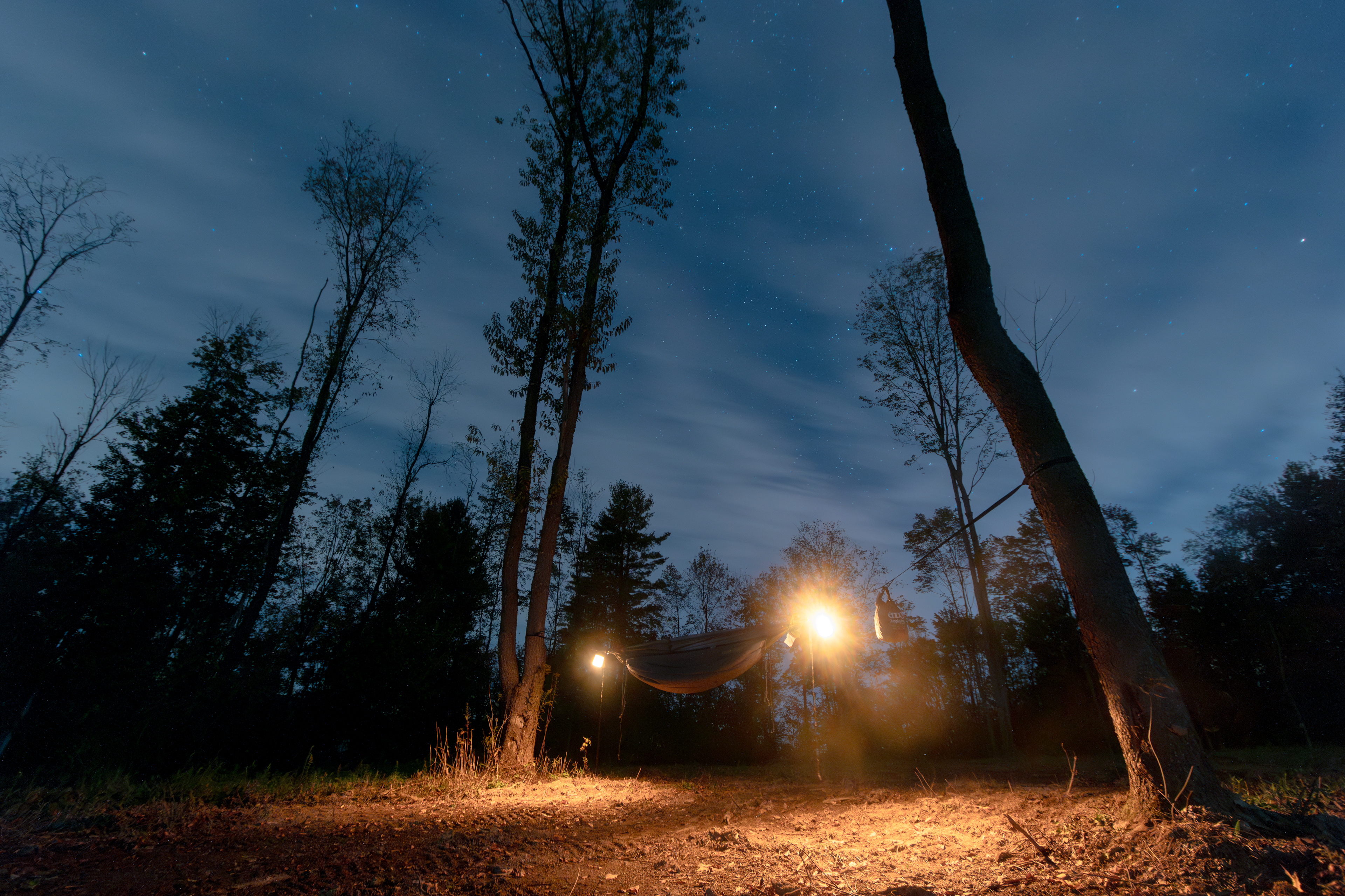 Hanging up my hammock to sleep under the stars.
