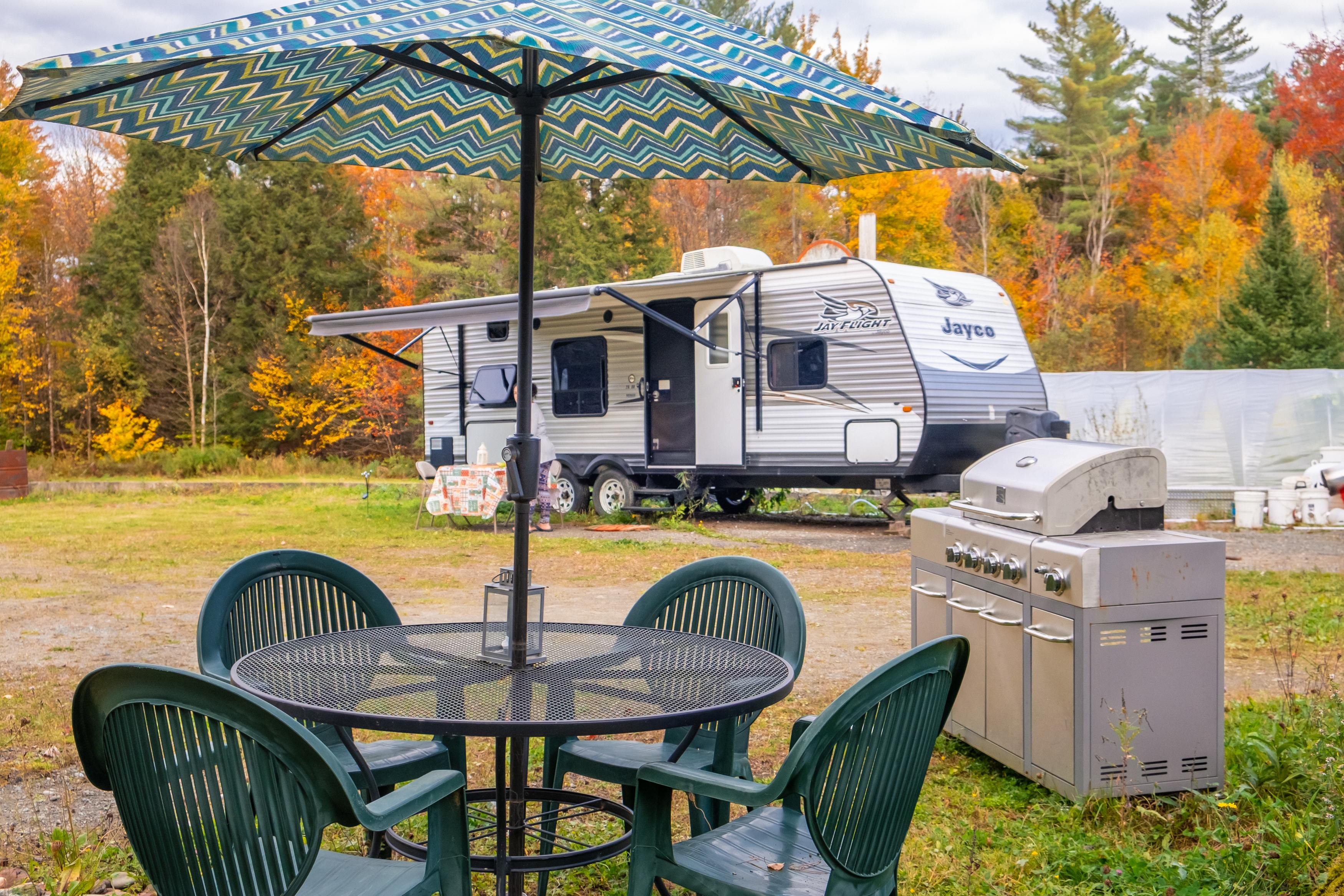 Patio table and large grill for guests to use.