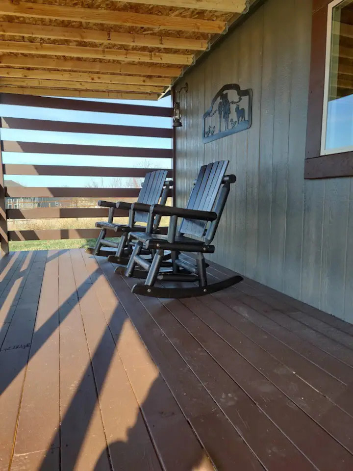 Each cabin has a porch with rocking chairs to sit and enjoy the peacefulness of the area.