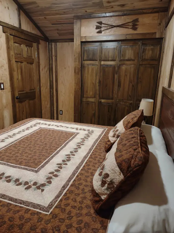 Howling wolf has a separate bedroom that has a King Size memory foam mattress. Blow up air mattresses are also available for more guests.